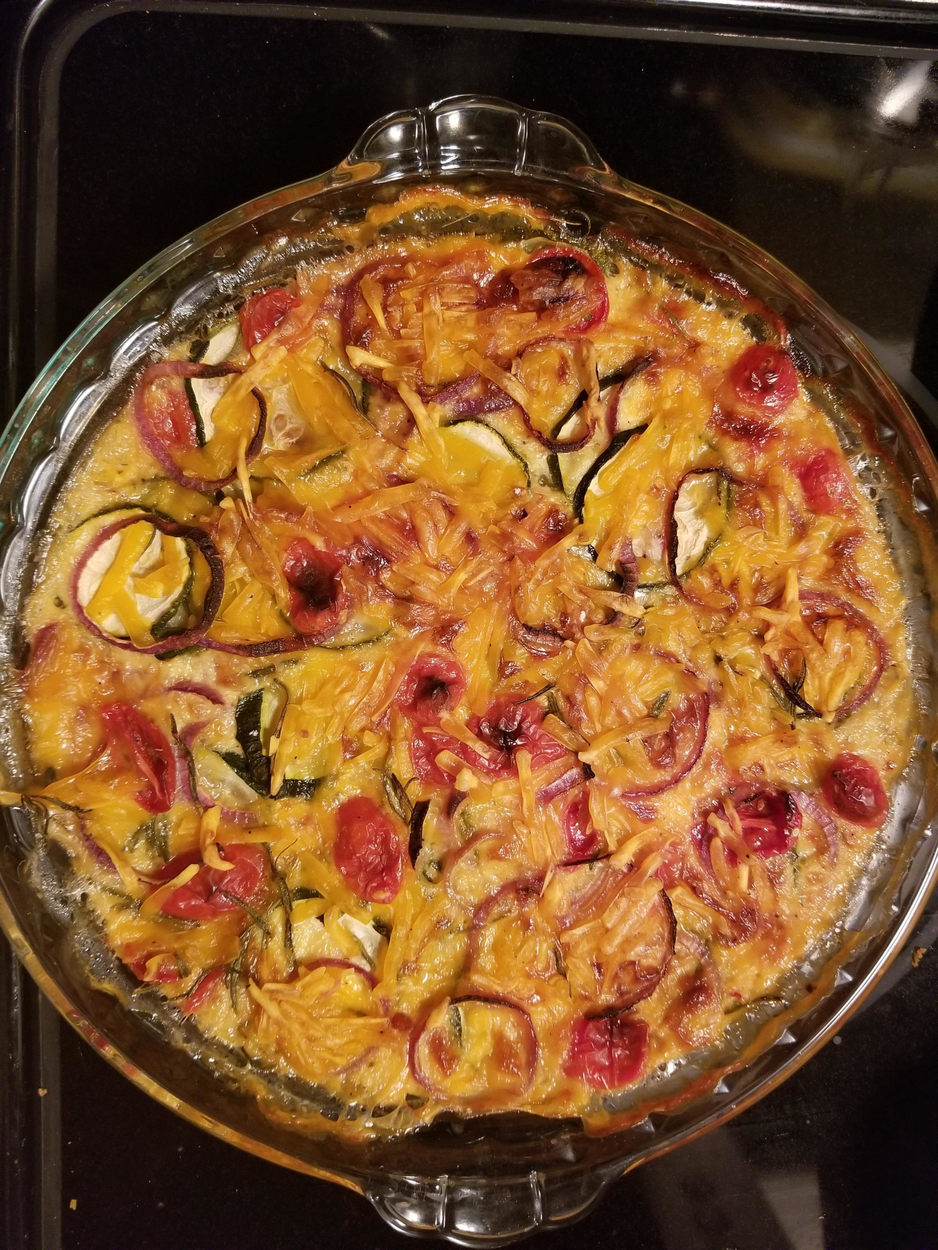 Crustless quiche. Zucchini, tomato, purple onion, fresh rosemary, just