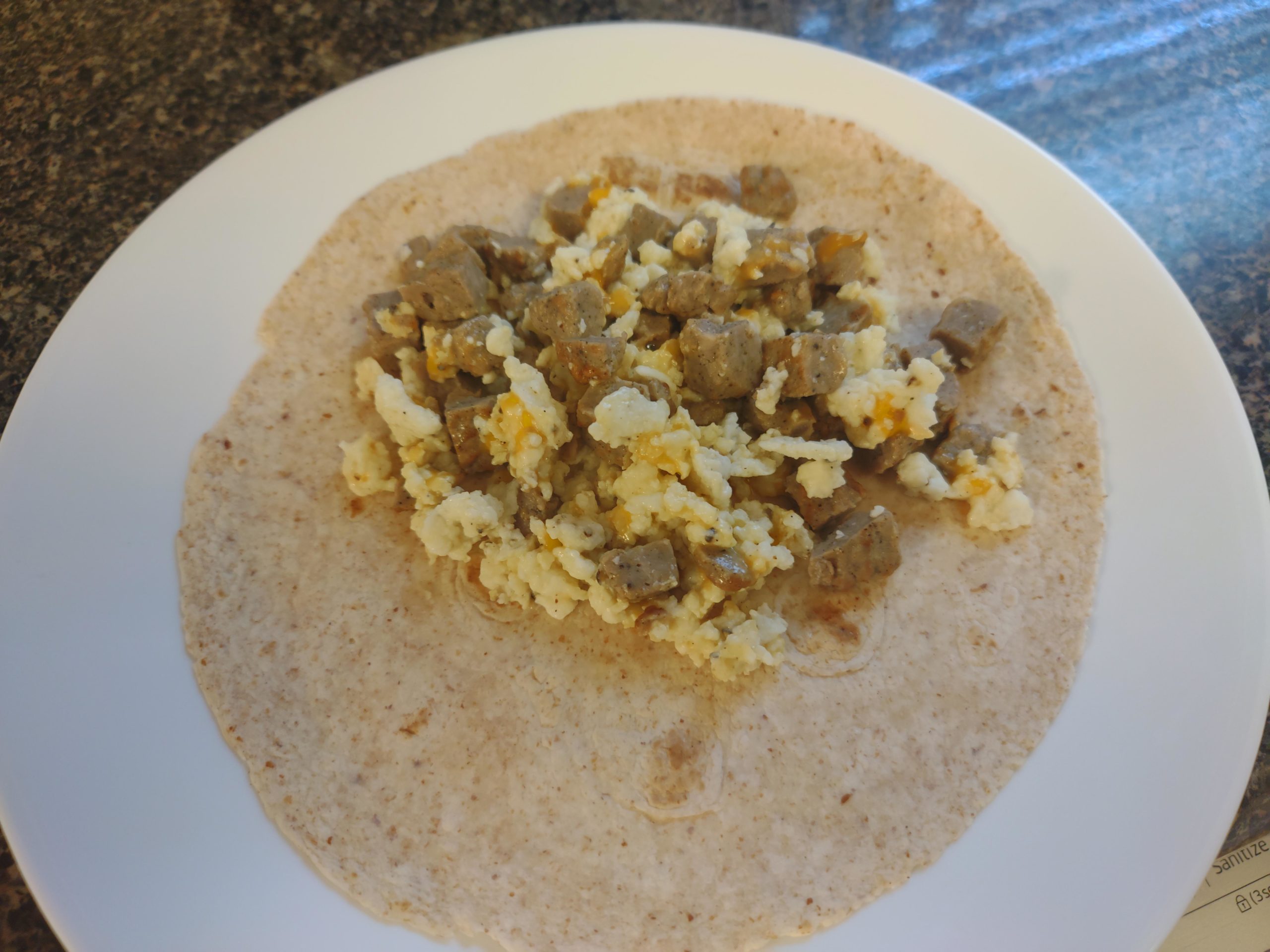 Exactly 200 calorie breakfast burrito! Turkey sausage, egg white, cheddar on flax shell Dining