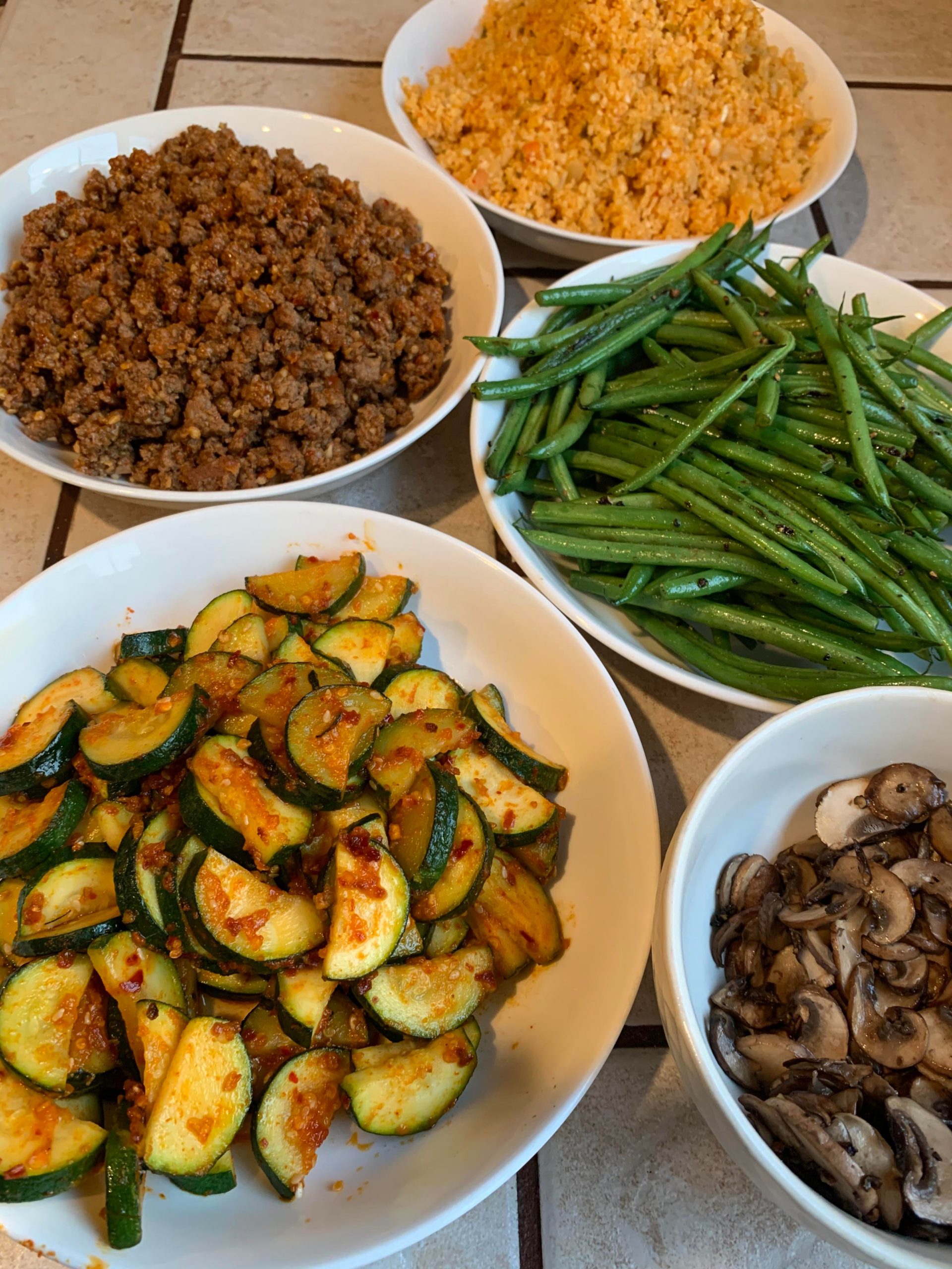 Beef and kimchi cauliflower rice bowls. Just have to plate my low carb