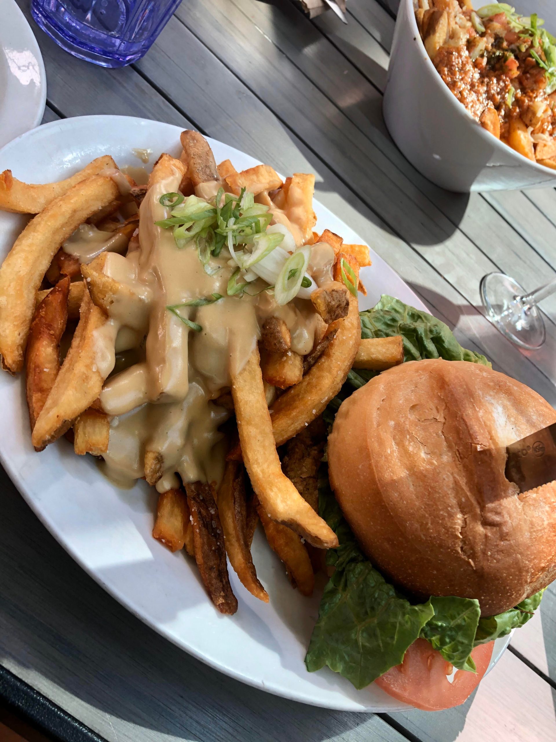 “Chick’n” burger and some groovy gravy fries really does hit the spot 🤤 want a bite? Dining