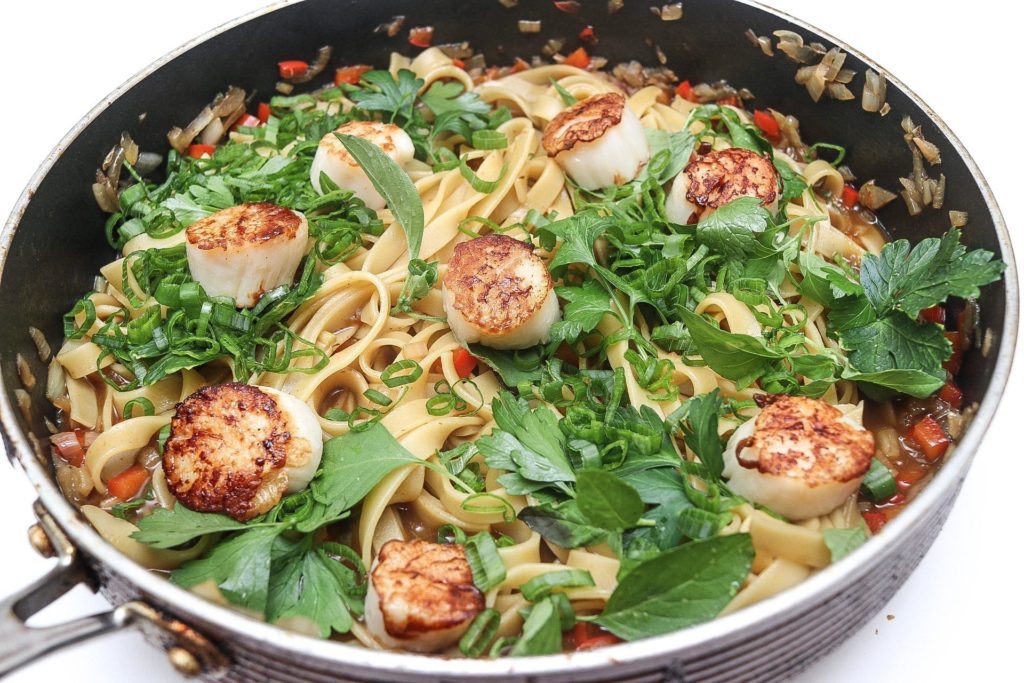 I made some crayfish pasta & scallops .