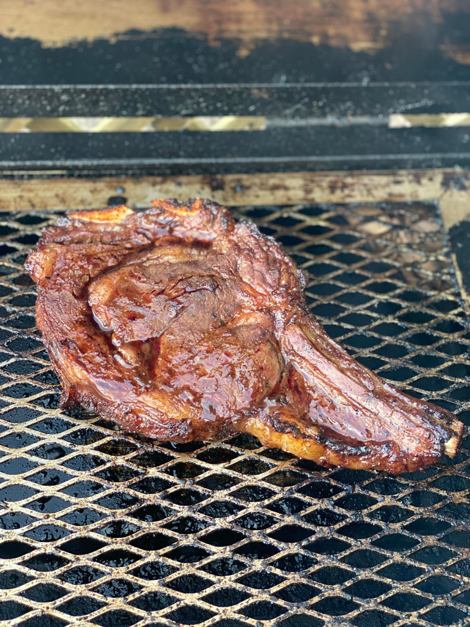 Marinated Bonein ribeye from our 1/4 cow purchase on a Holland grill
