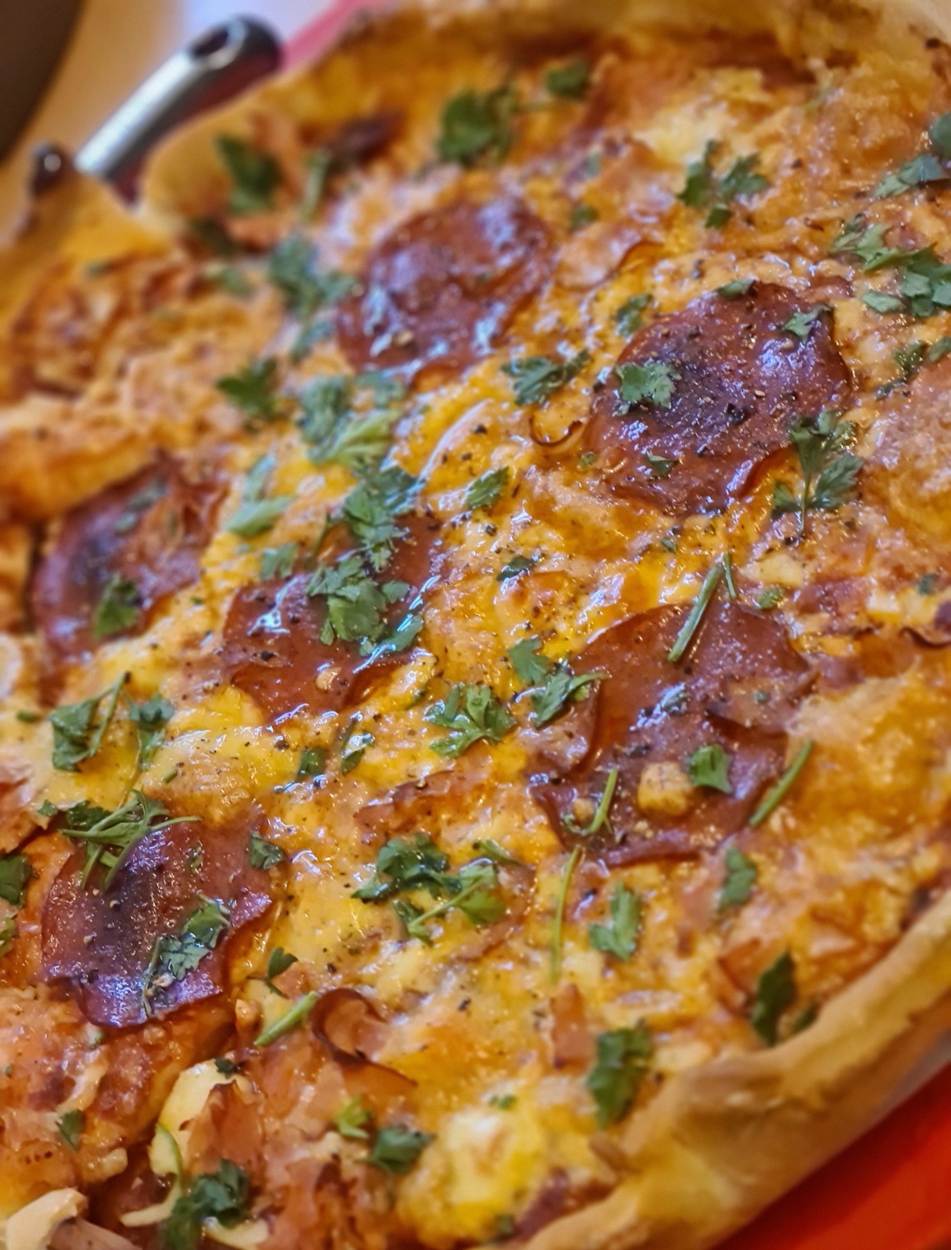 Homemade deep dish pepperoni and mozzarella pizza. Dining and Cooking