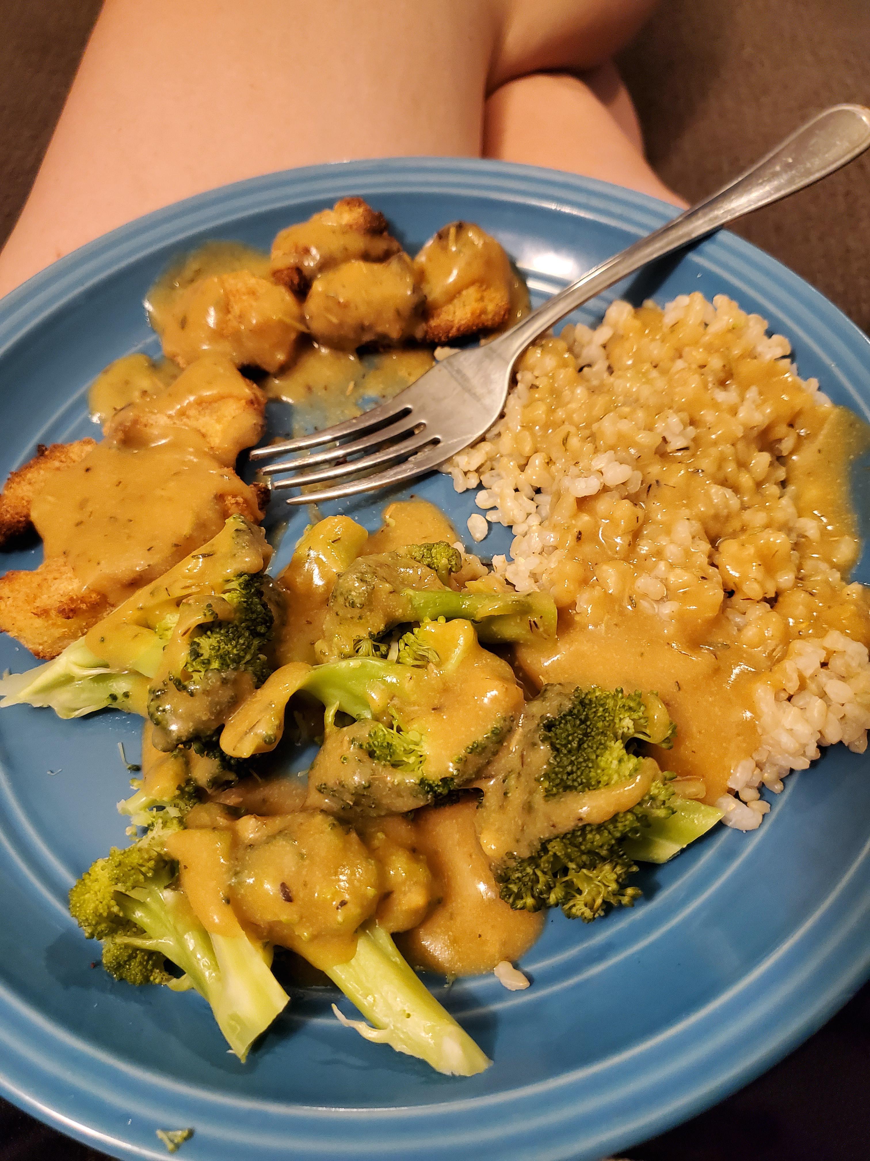 Breaded cauliflower steaks, brown rice, broccoli, and brown gravy