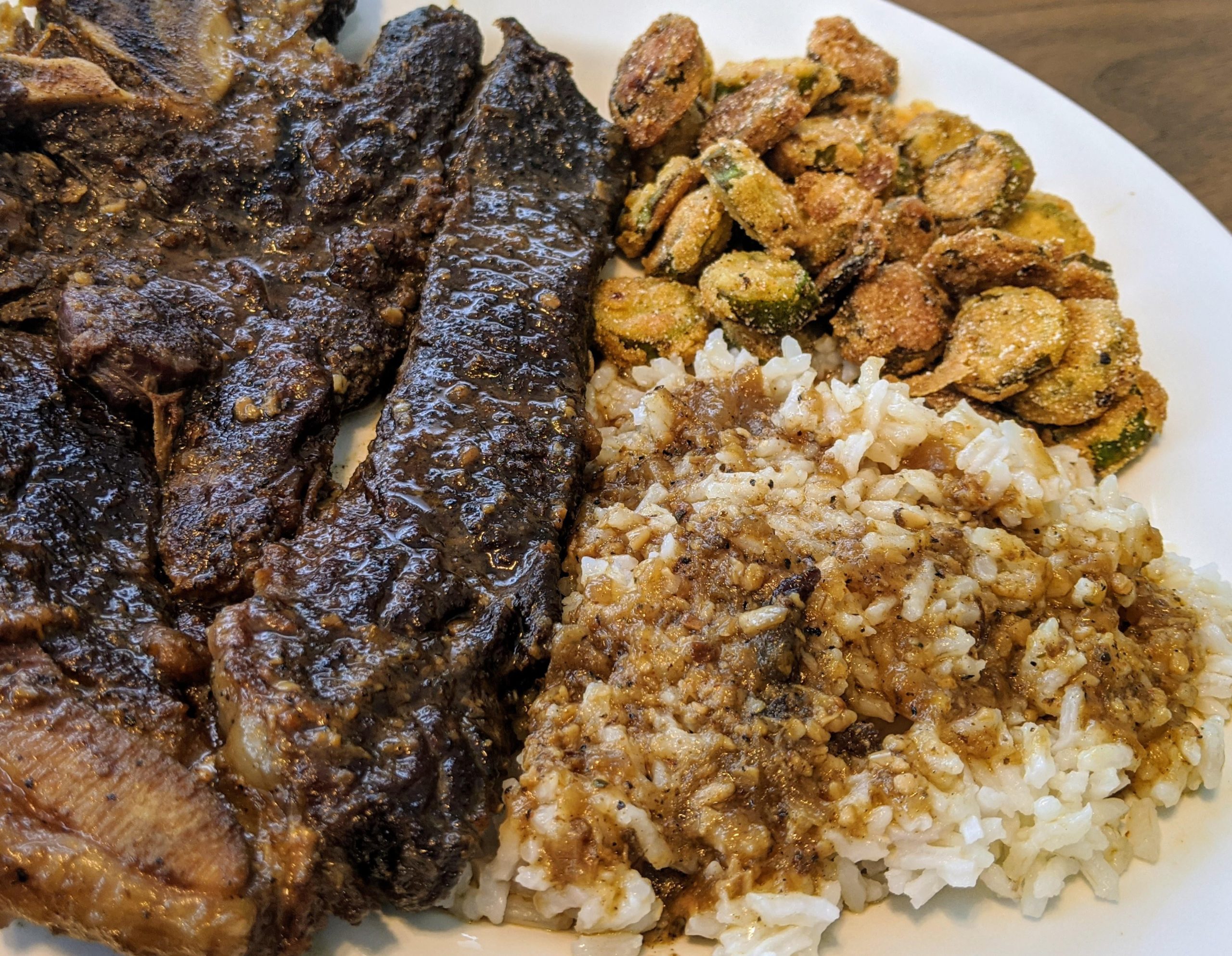 Seven steak, rice and gravy, and fried okra. Not pictured bourbon