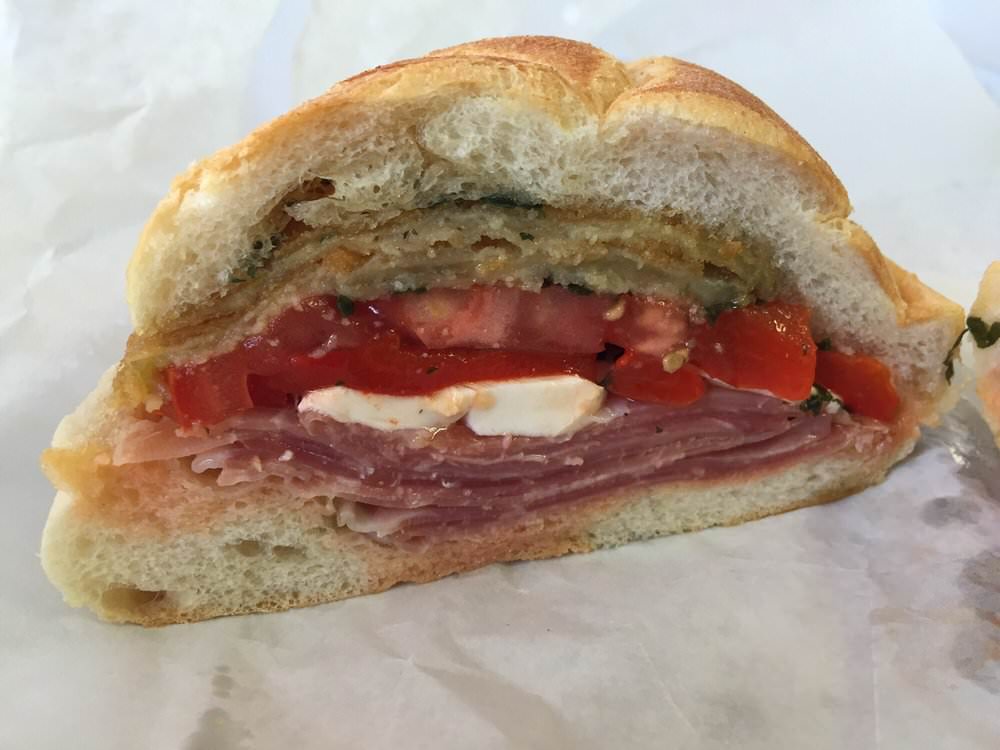 Prosciutto, mozzarella, roasted peppers, tomato, eggplant, basil, olive