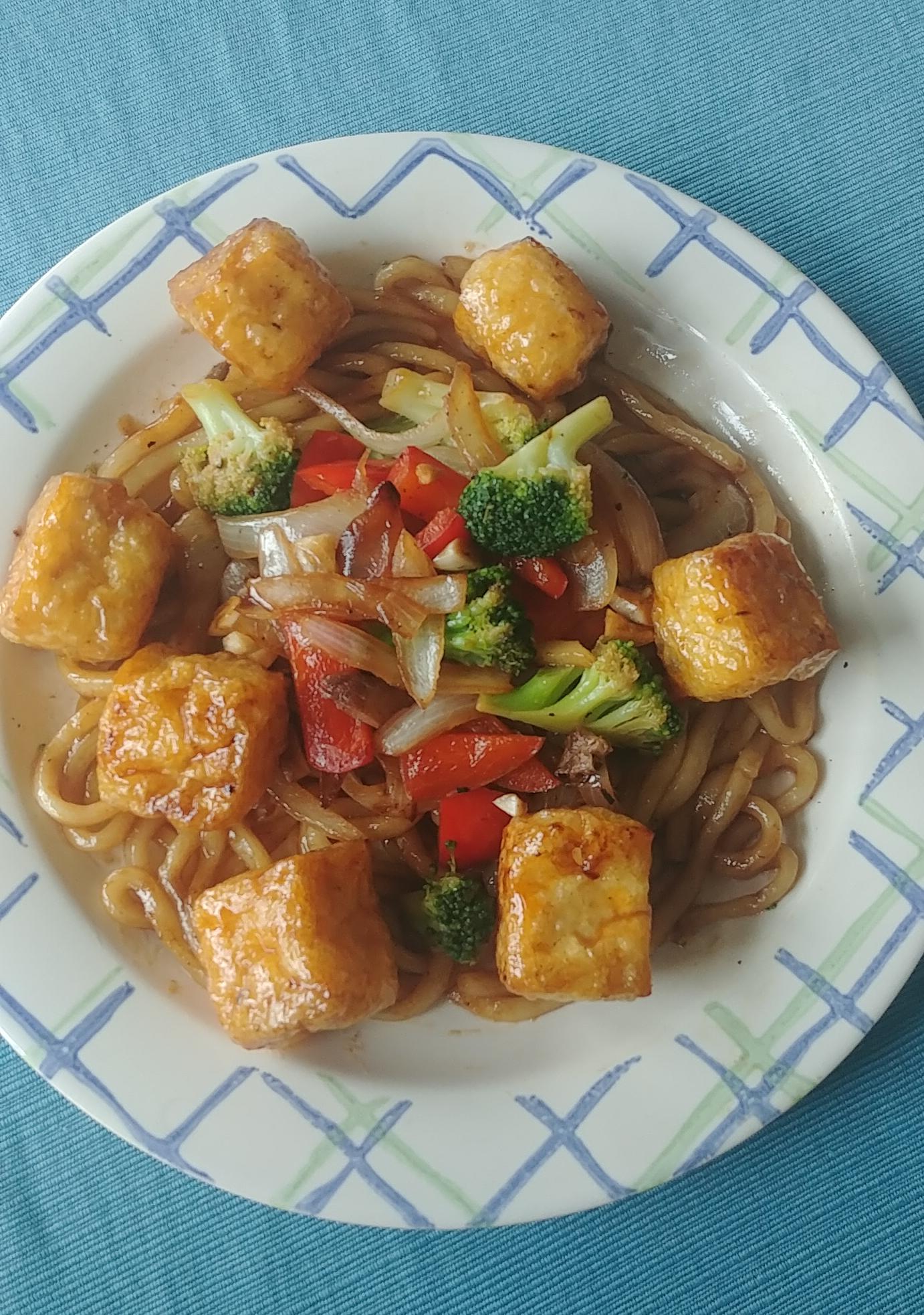 Teriyaki udon & tofu puff stir fry with broccoli, red pepper, onion
