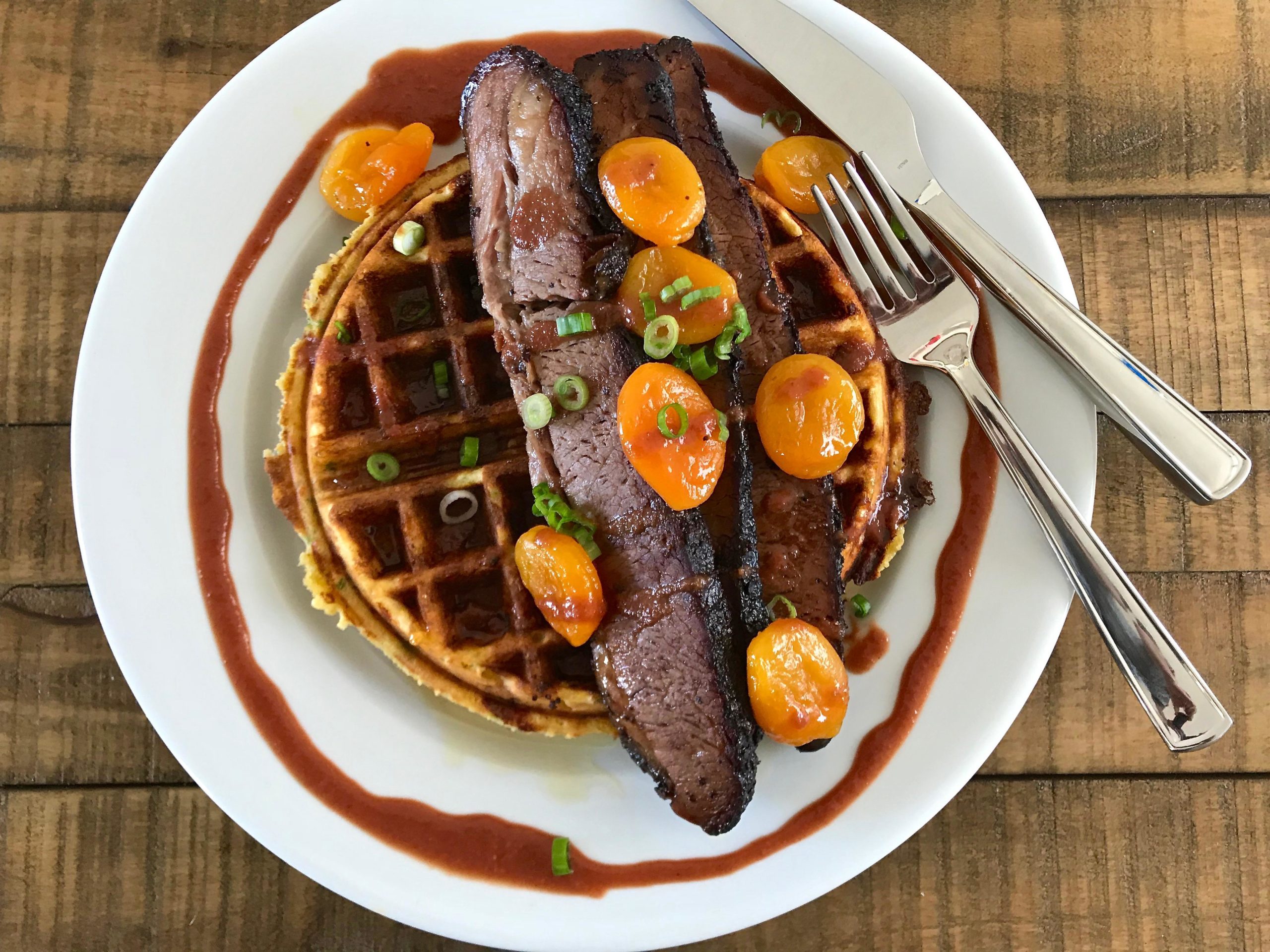Smoked Brisket and Cheddar Jalapeno Cornbread Waffles with Spiced Honey