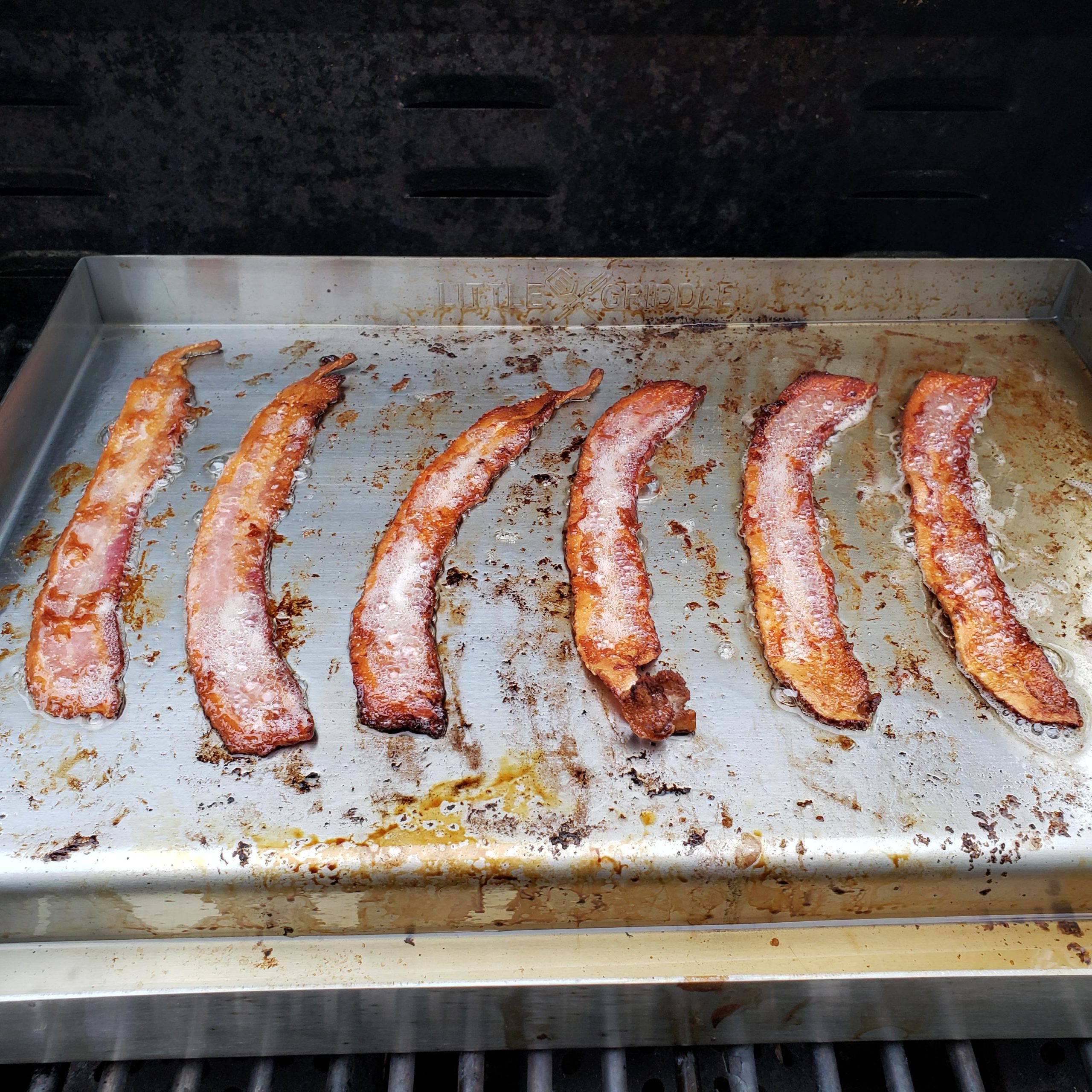 Bacon on my new griddle grill topper. Came out great. Made eggs in the