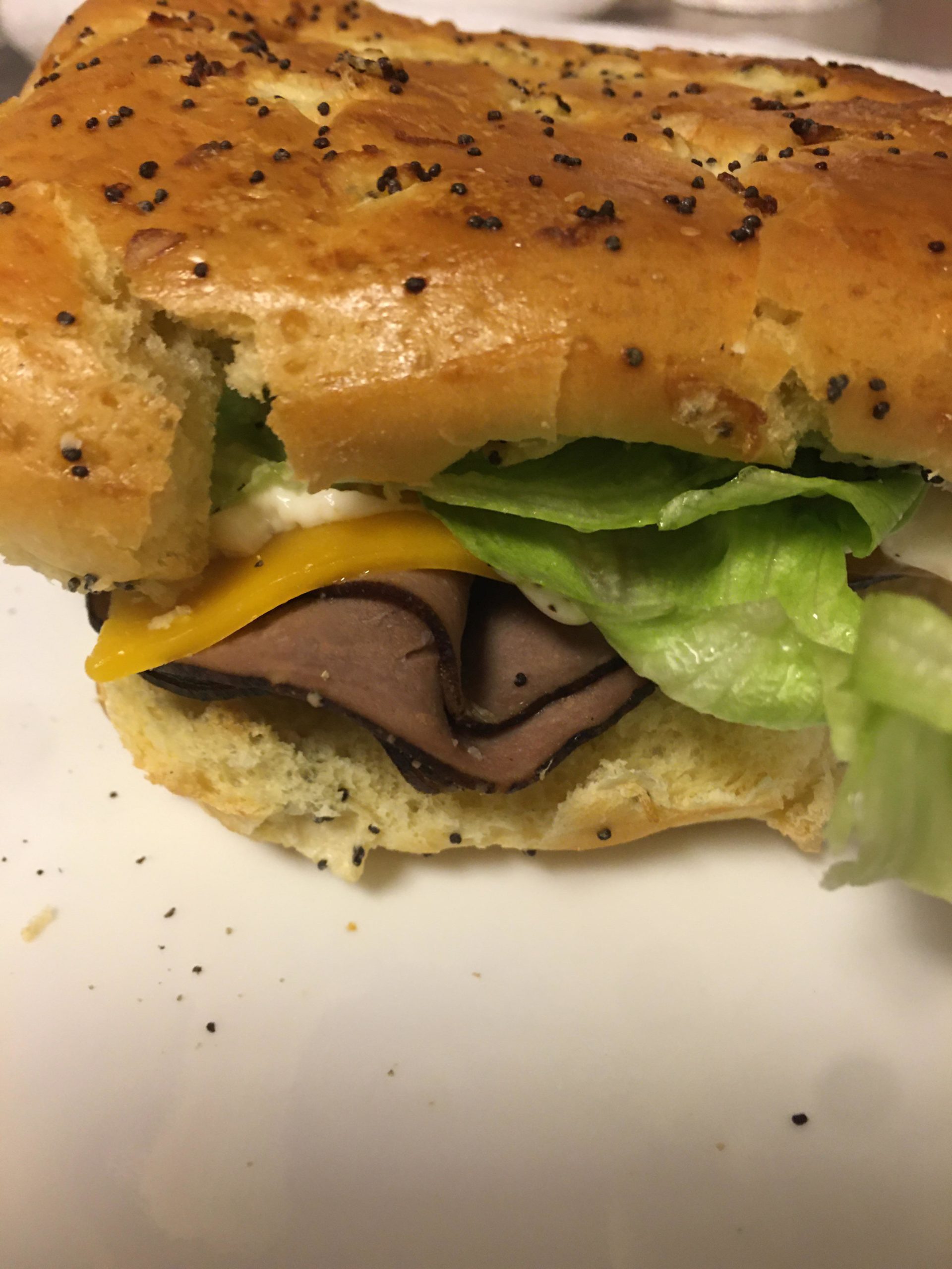 At home “Arby’s” inspired sandwich. Onion bun with roast beef, mild