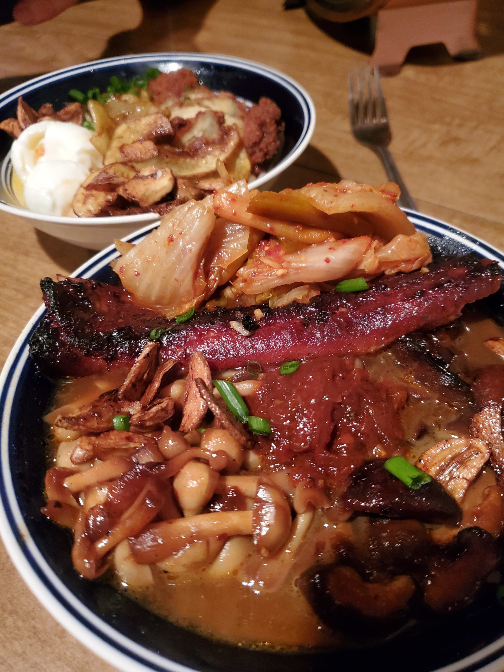 Tantanmen with fried egg and enoki mushrooms. Dining and Cooking