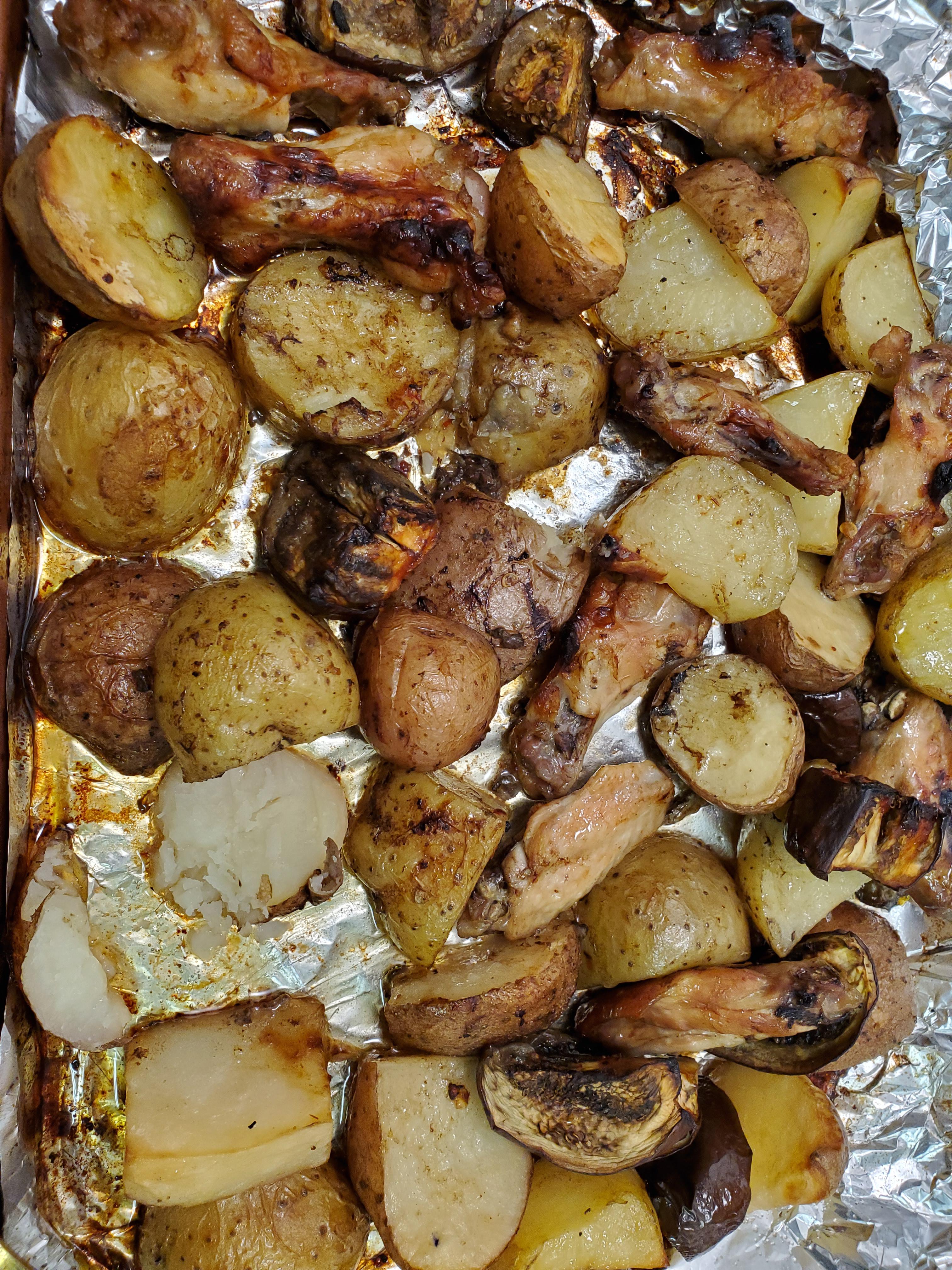 Tin foil oven bake. Potatoes, eggplant, chicken wings, Chipotle, salt
