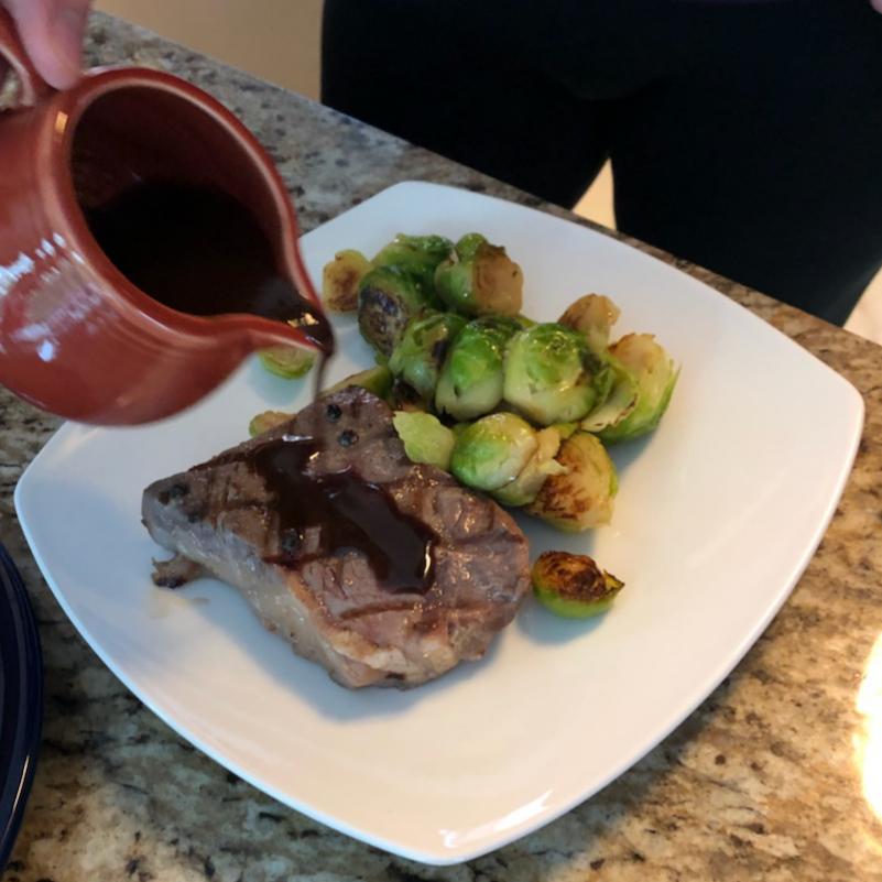 Rare steak with wine reduction/demi glace pan sauce & brussel sprouts