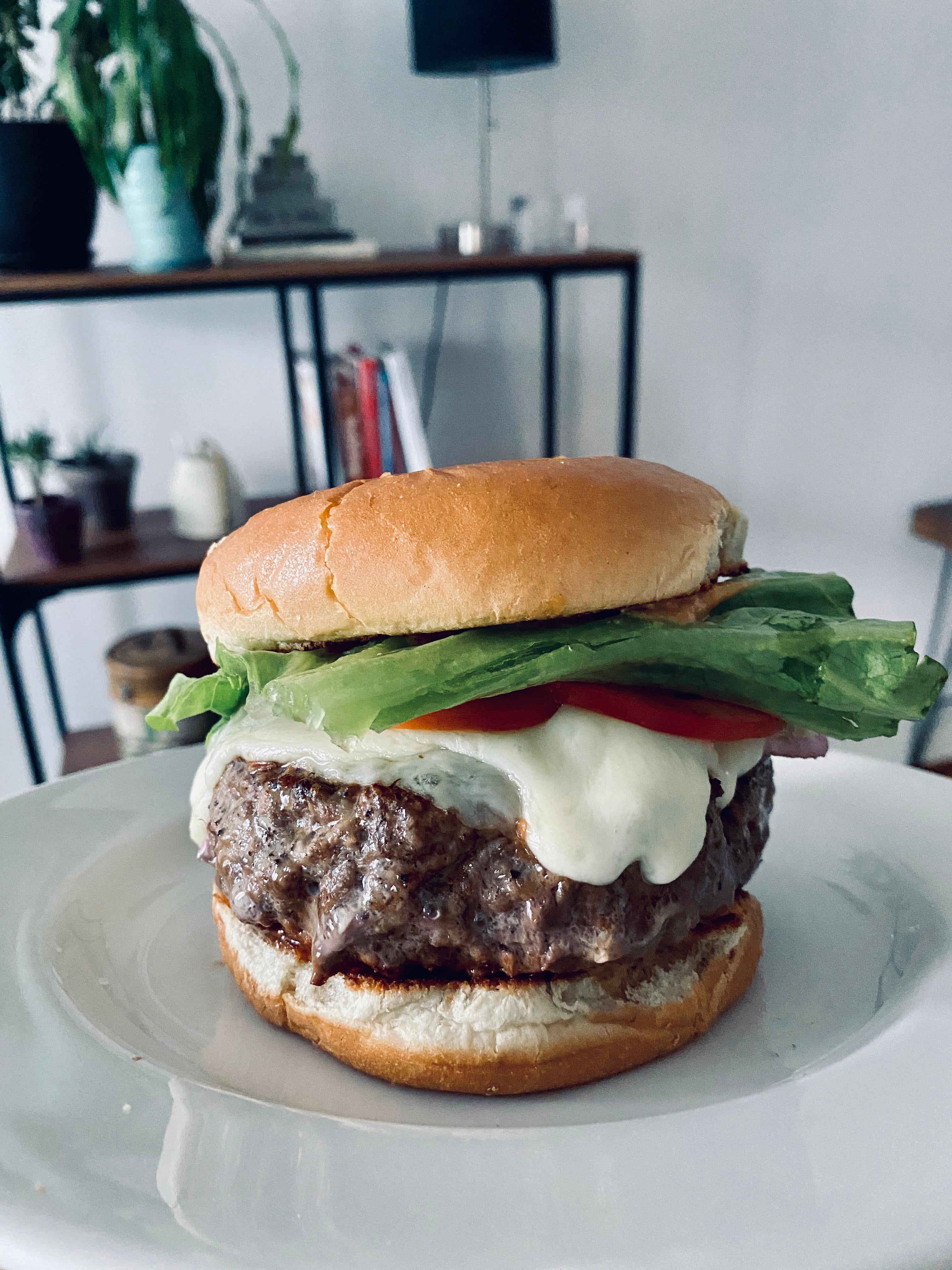 My first 1lb burger. Cast iron for the crust and then in the oven to