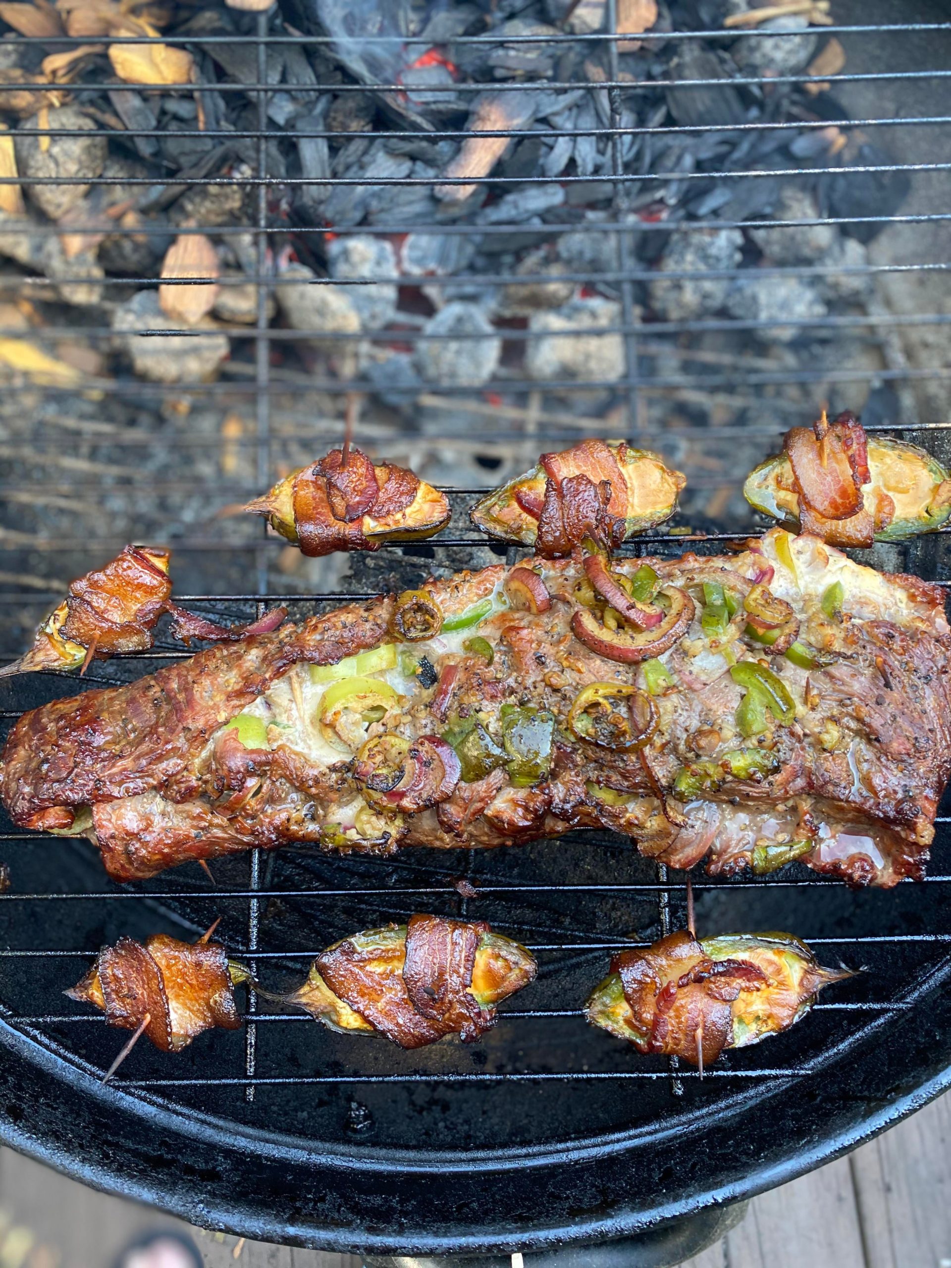 Smoked skirt steak stuffed with peppers, onion, garlic and got cheese