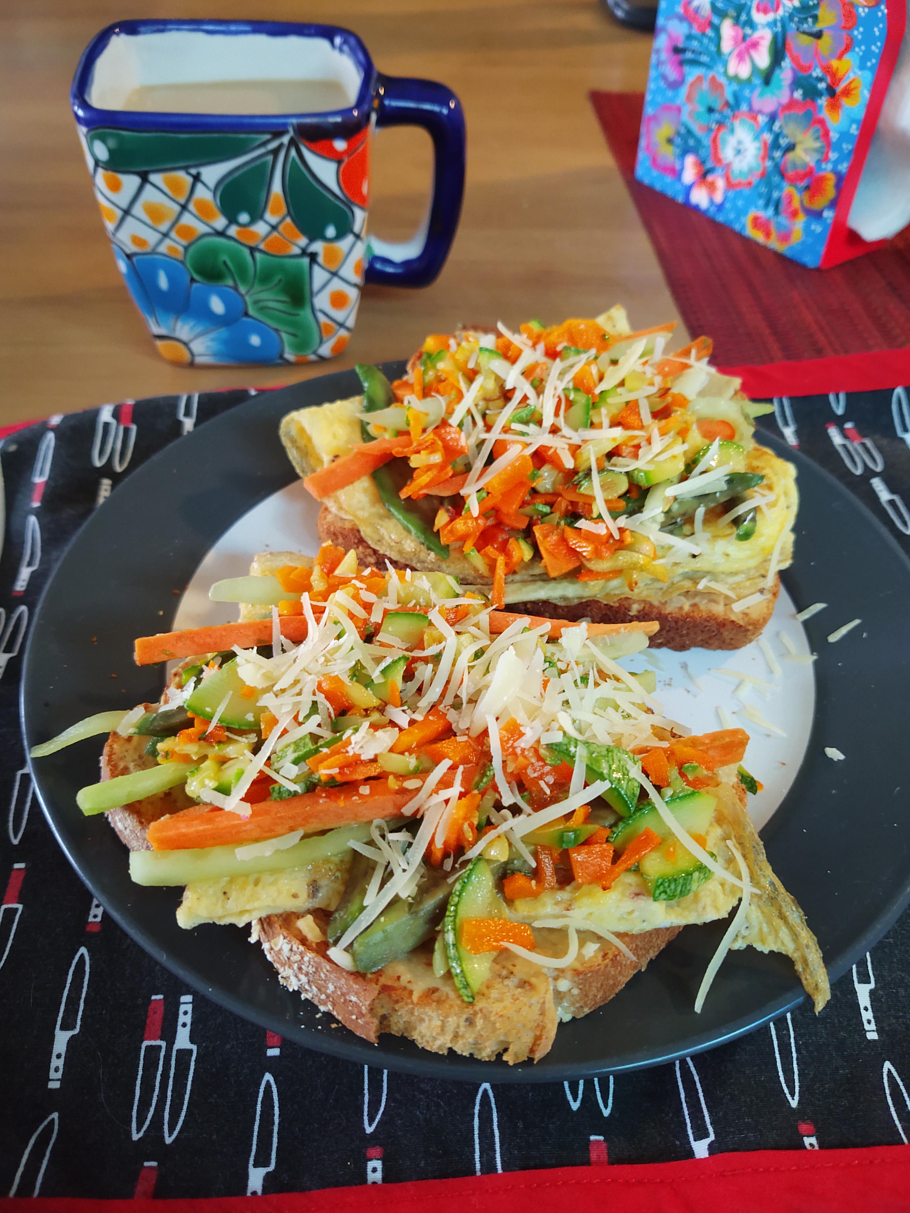 Toast with scrambled eggs, hummus and veggies Dining and Cooking