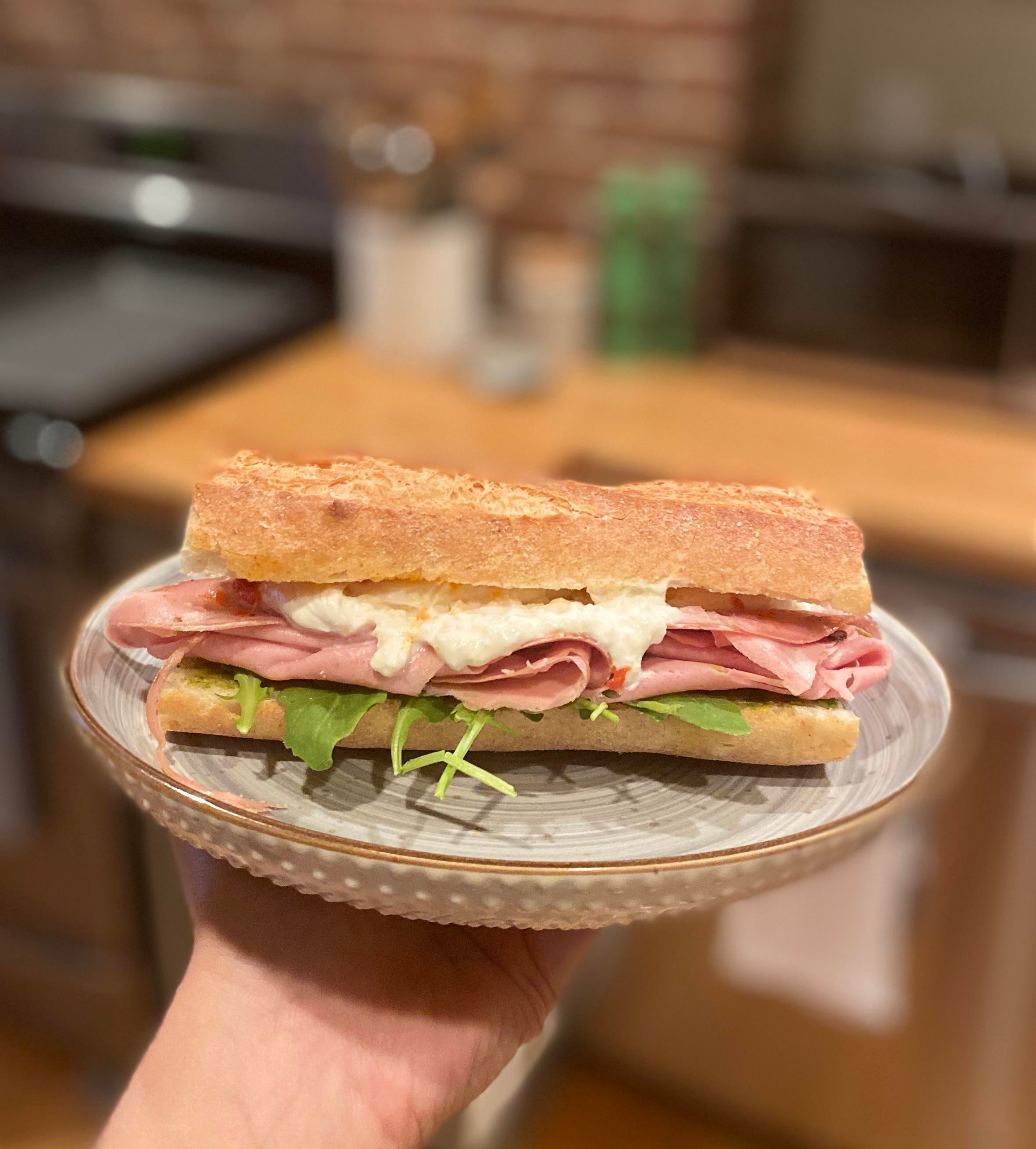 Mortadella and Burrata with Calabrian chili oil, pistachio pesto and