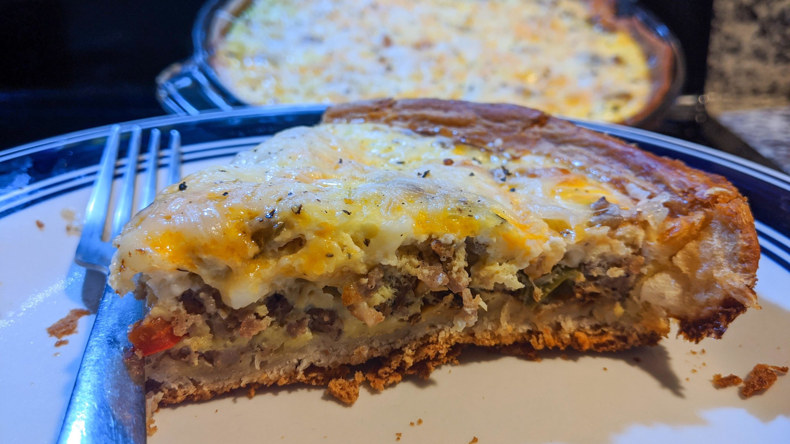 Quiche with sausage, carmelized onions and peppers. My grandmas recipe