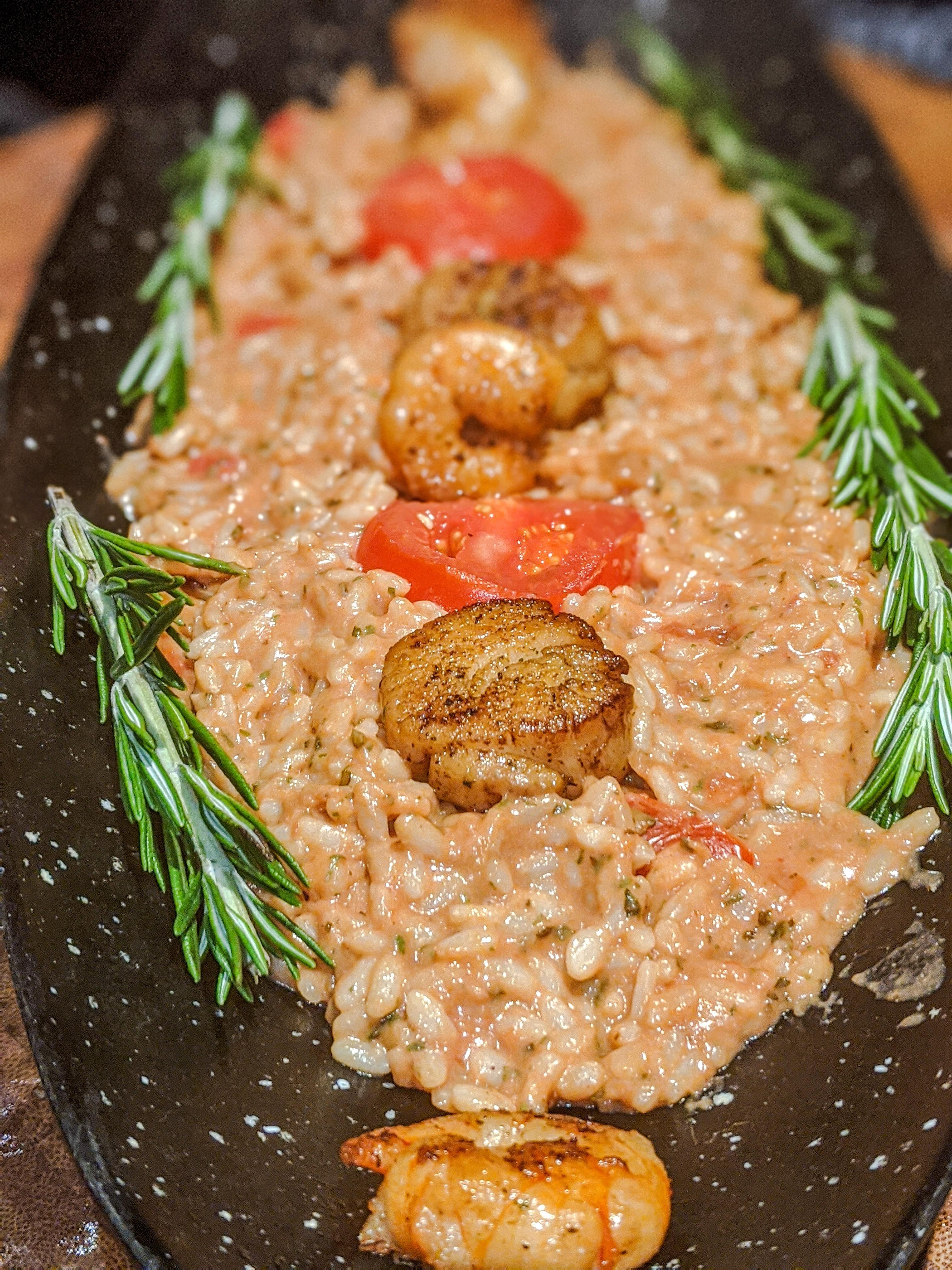 Main course Seafood risotto (rosemarytomato risotto; hence, the