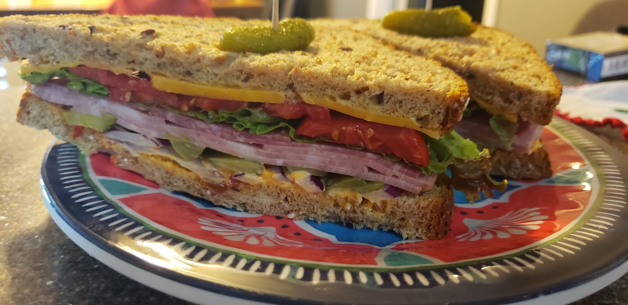 Salami and mortadella on wheat with LTO, pickle, cheddar and calabrian