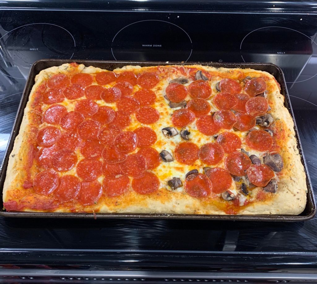 Made a half & half sheet pan pizza for the fiancé and I