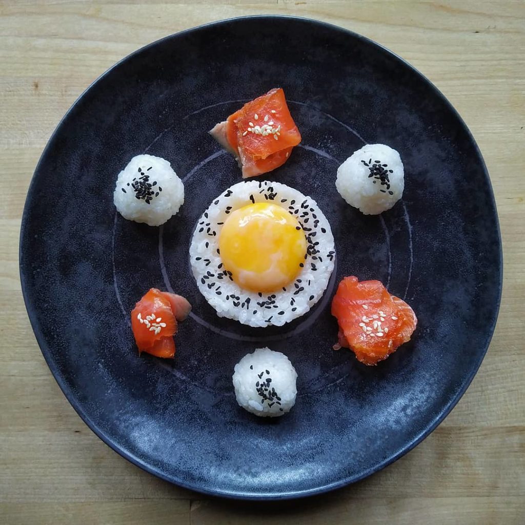 [I made] Self-saucing rice with sous vide egg yolk, smoked salmon and toasted sesame seeds.