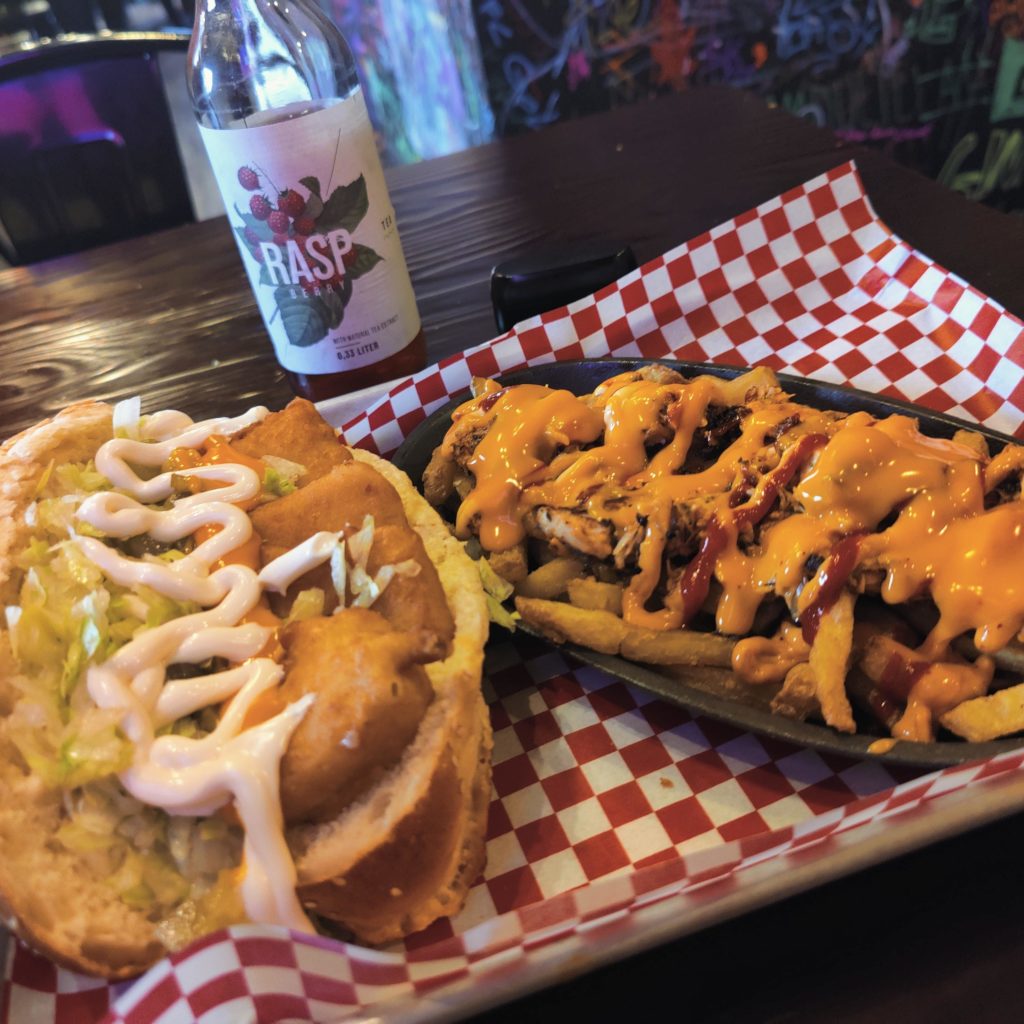 When I'm hungover, I normally eat this: Pulled Chicken Poutine and a Fishstick Sandwich.