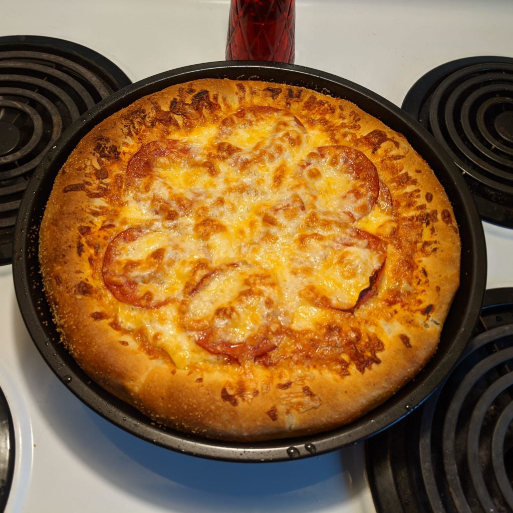 New sauce recipe, new pan = Tonight's Deep Dish Pepperoni Pizza (12" Pan for size reference)