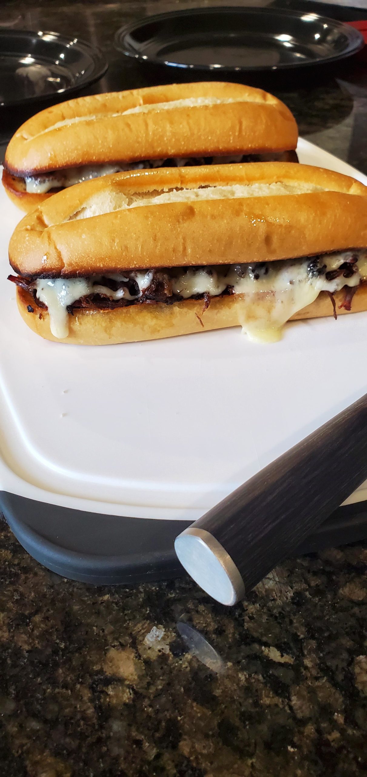 Smoked and shredded chuck roast w/ swiss cheese for french dip