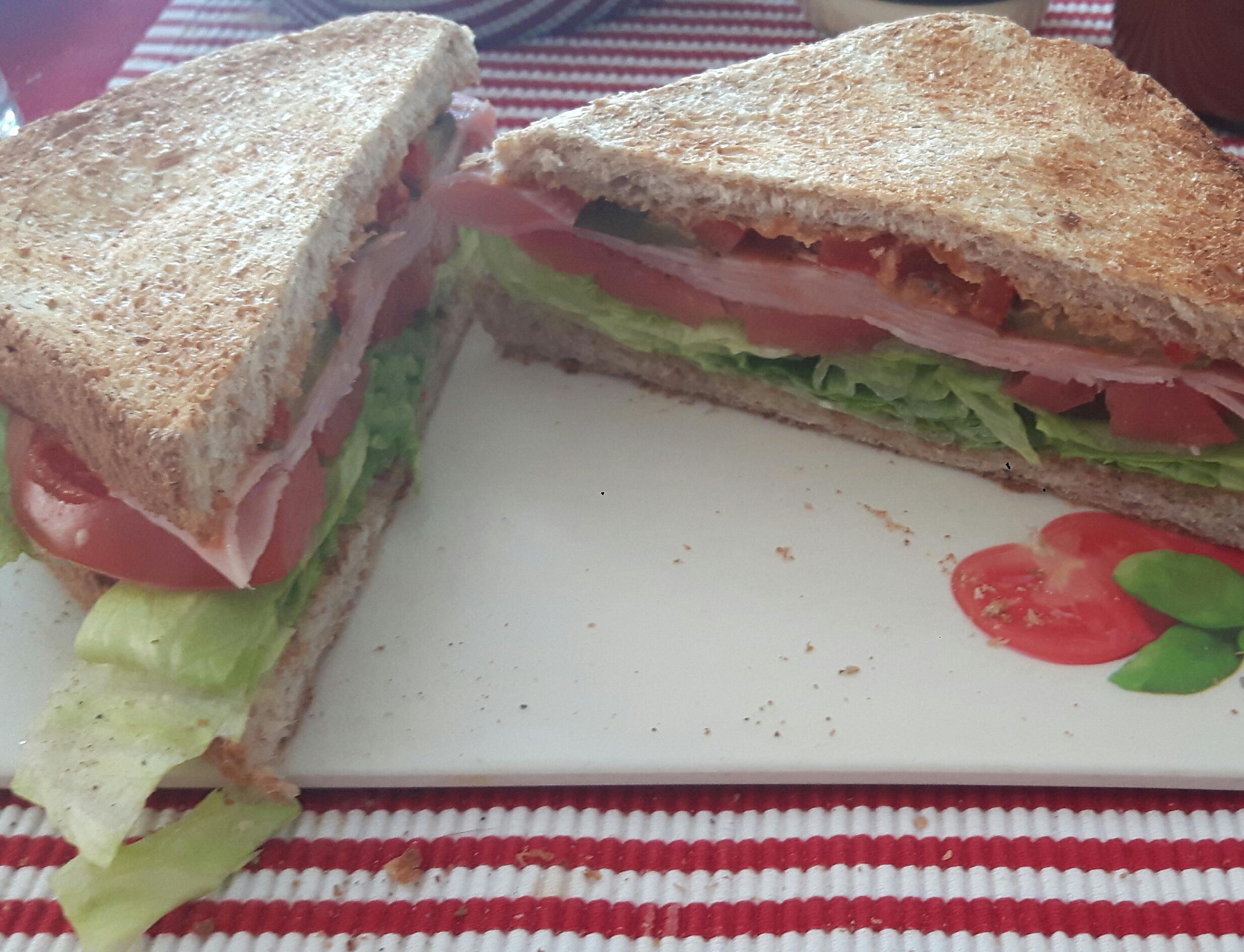 Ham sandwich with lettuce, tomato, pickled bell pepper, mayo and ...