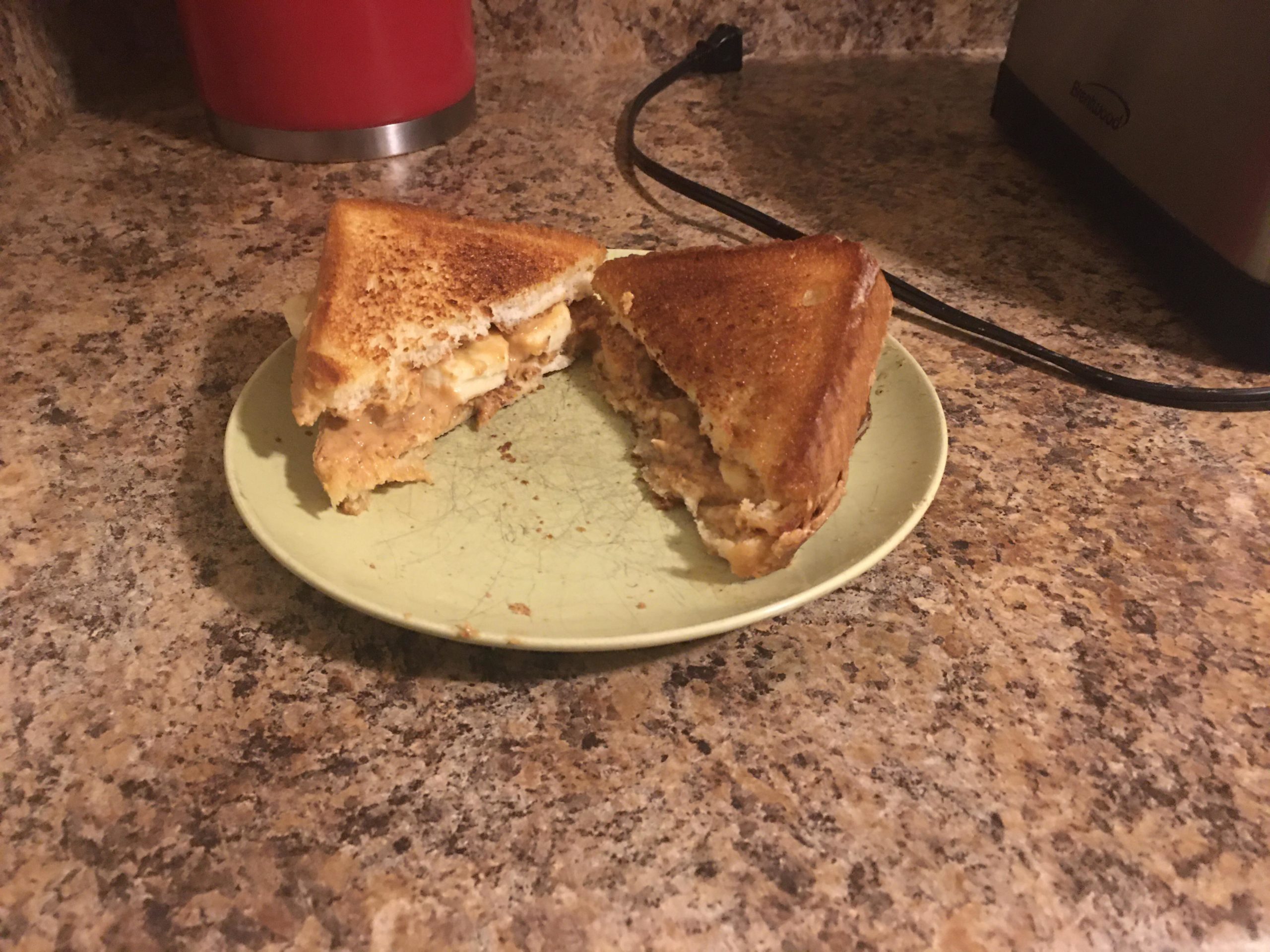Fried peanut butter and bananas on Texas Toast and fried in three