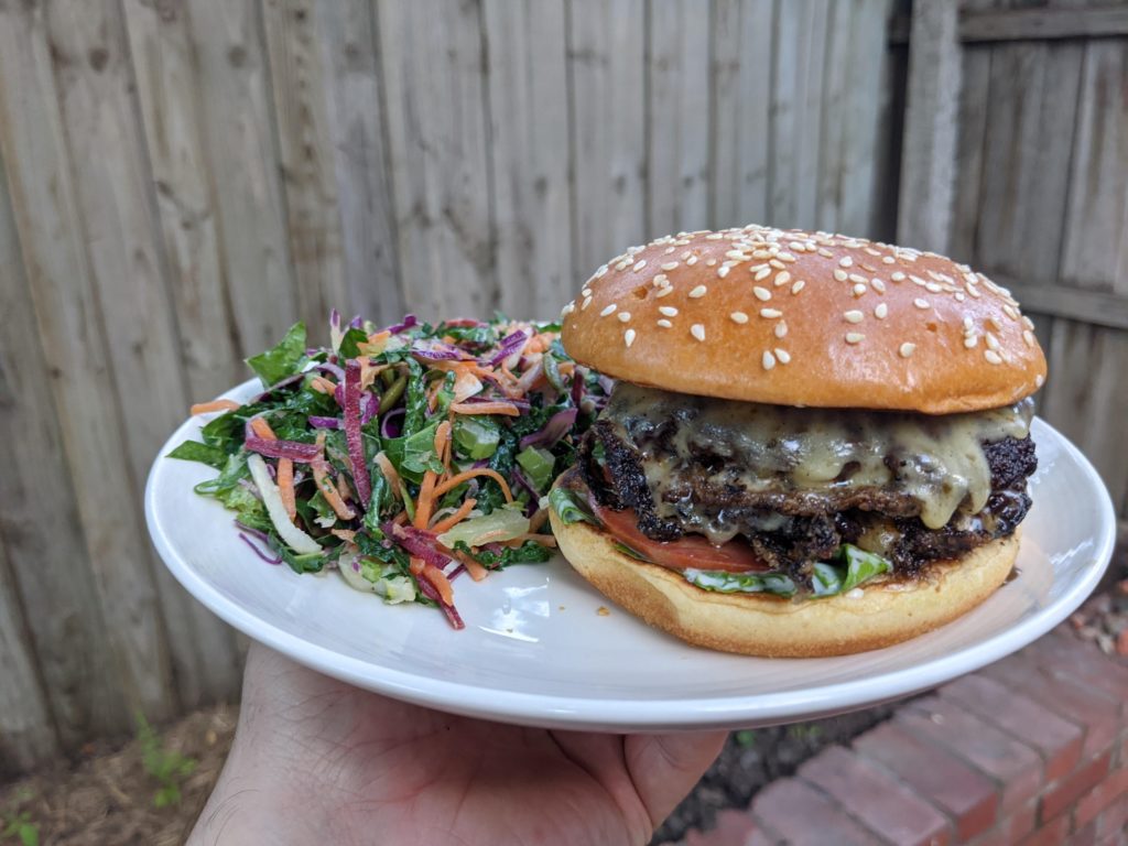 A weeknight craving satisfied. Two 3oz smashed patties, double cheese in the cast iron. Reaching my limits without a nice flat plate and proper press, but they're still fantastic.