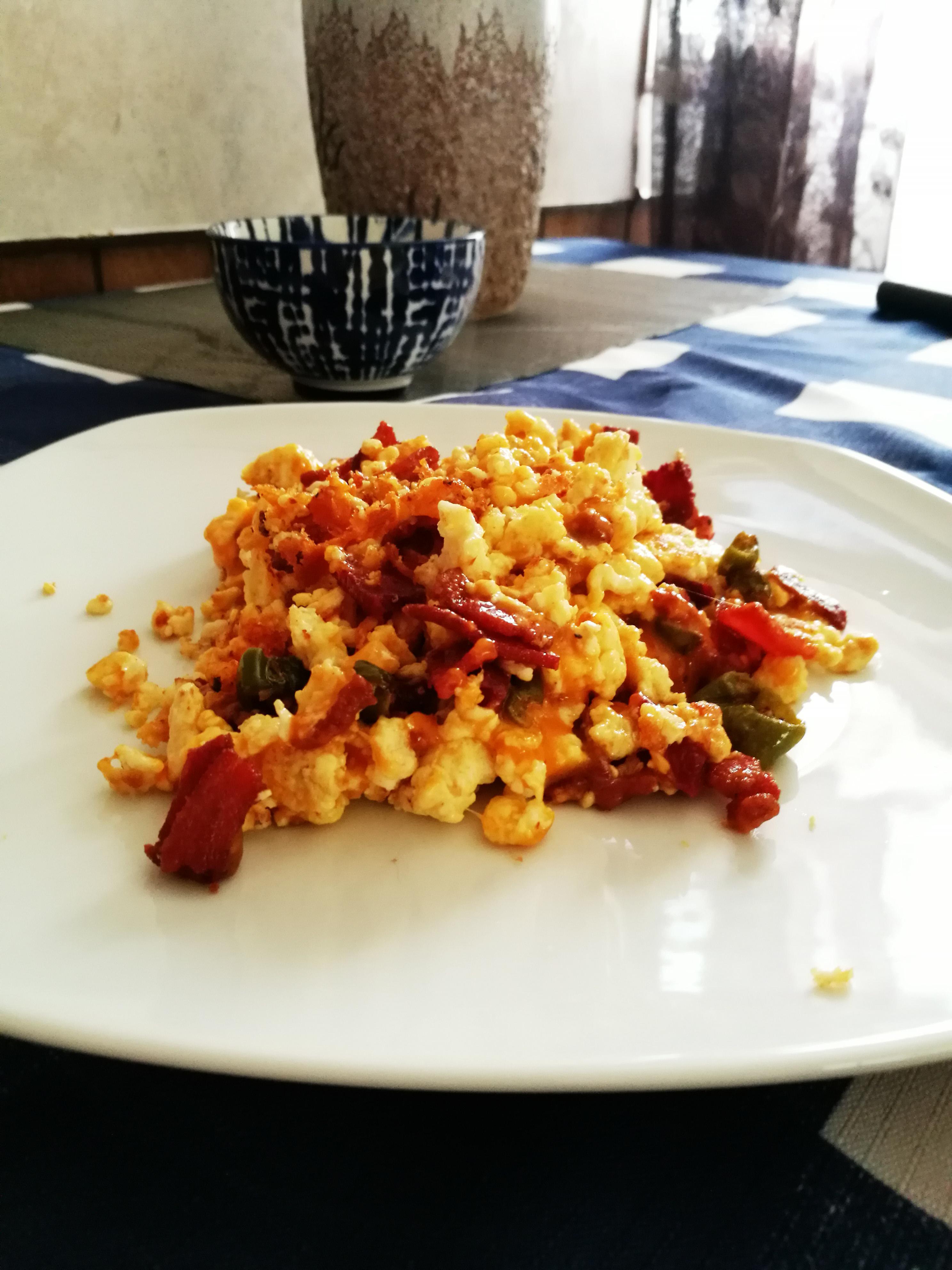 Scrambled eggs, bacon, garlic sausage, and jalapenos! What do you think