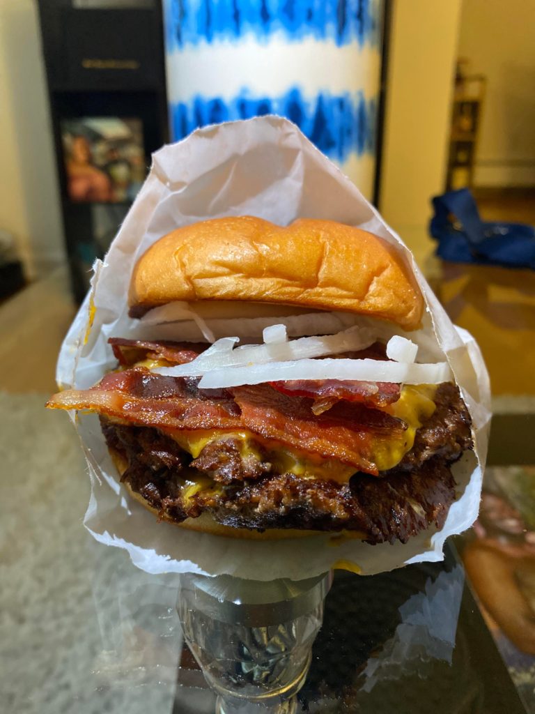 Double cheeseburger with onions and bacon from Shakeshack