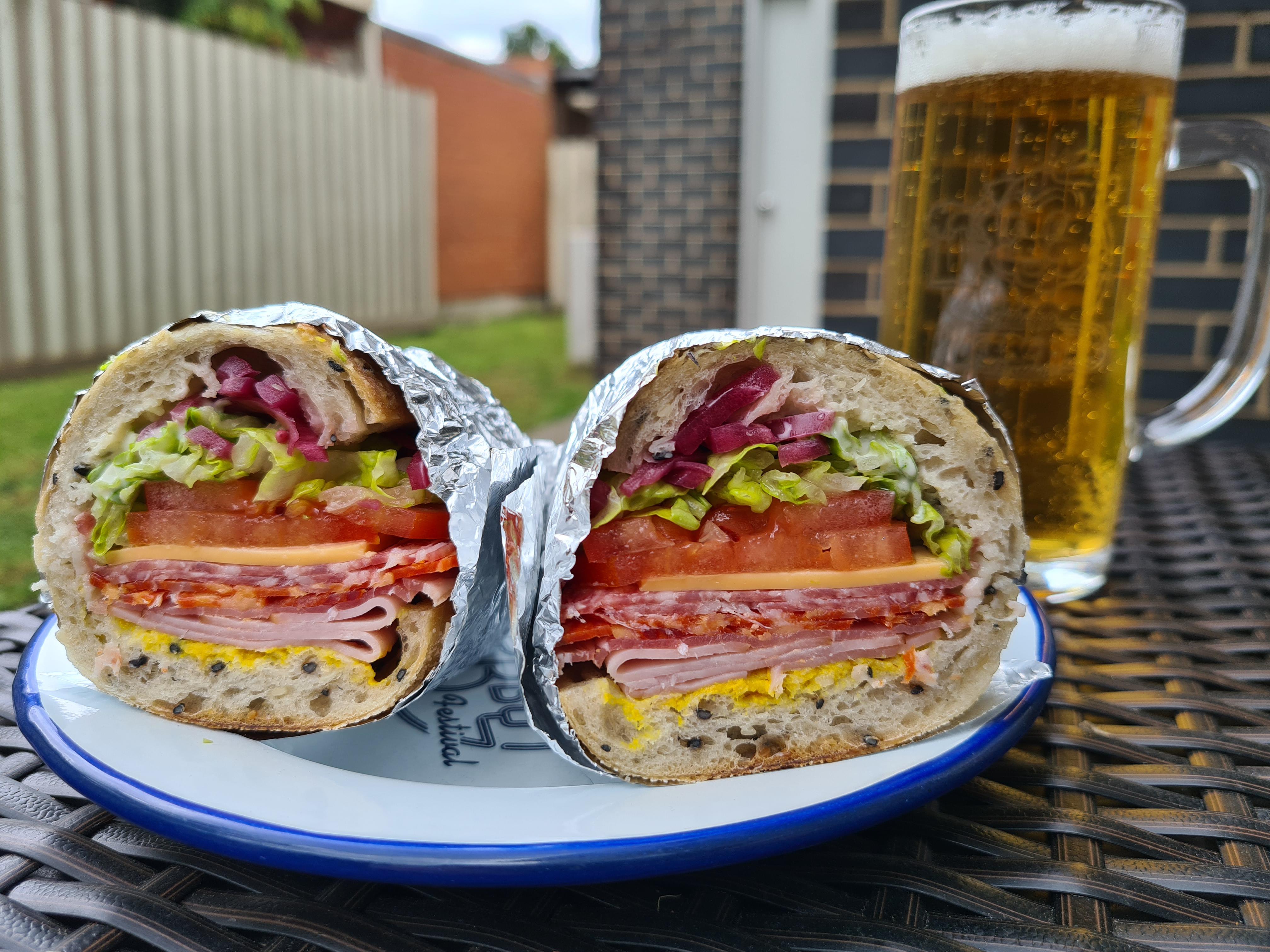 Ham, prosciutto, pepperoni, salami, cheddar, tomato, pickled red onion