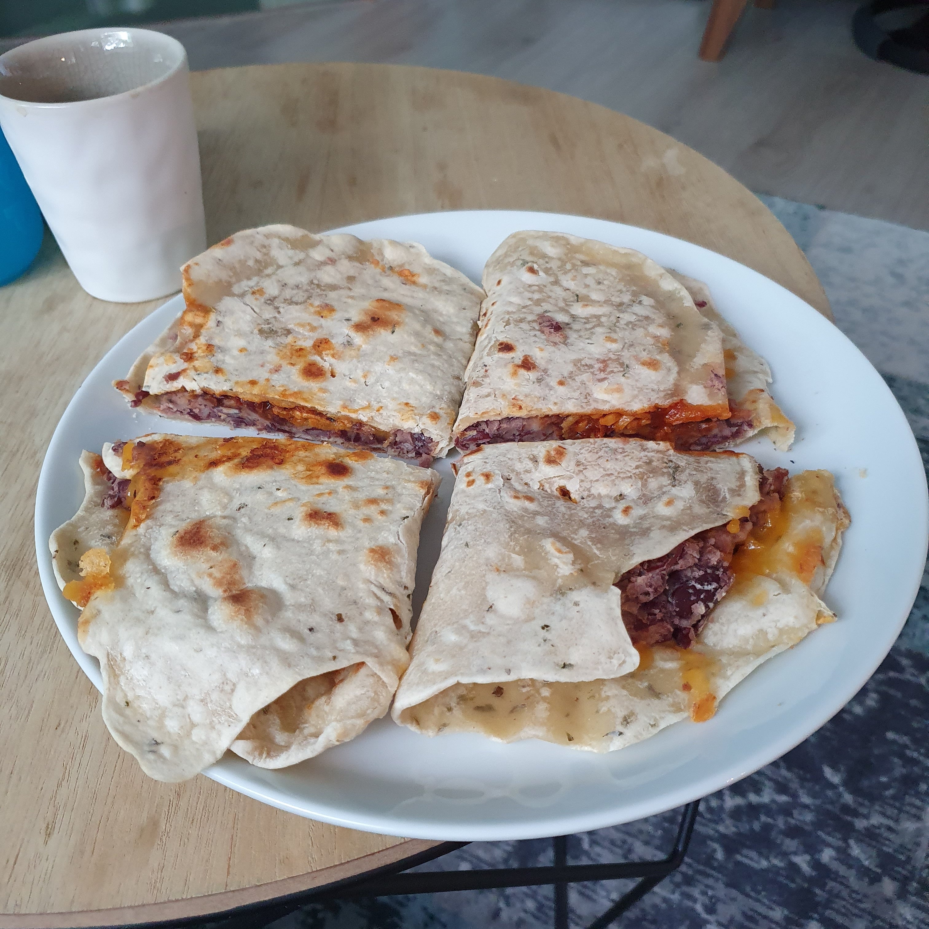 Tonights dinner, quesadilla with homemade tortilla, refried beans and