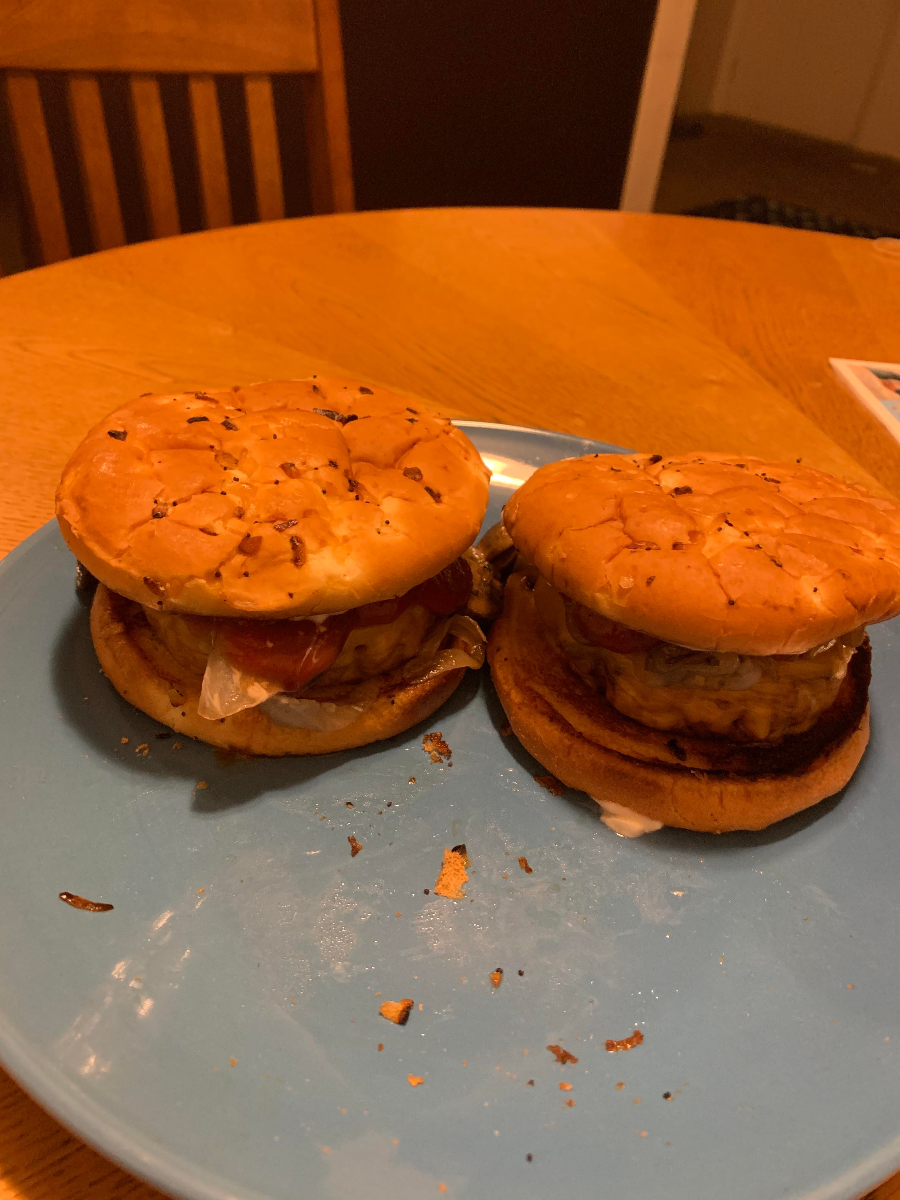 Beyond Burger Patties on Toasted Onion Bun with Cheddar, Sautéed Onions