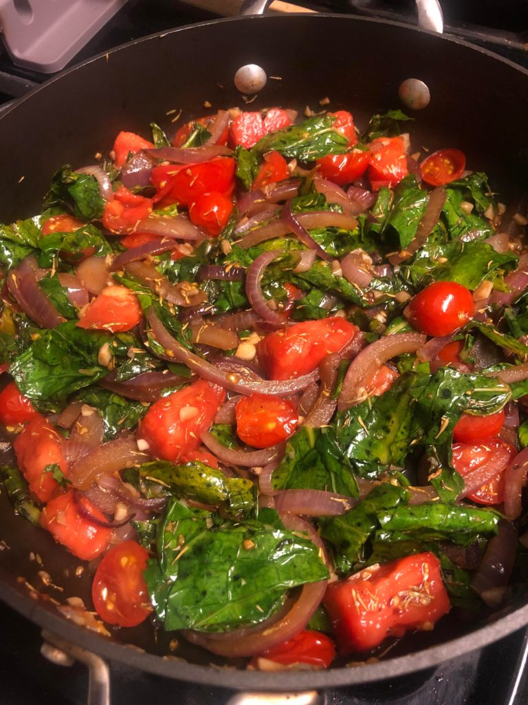 Stir-fried kale with tomatoes