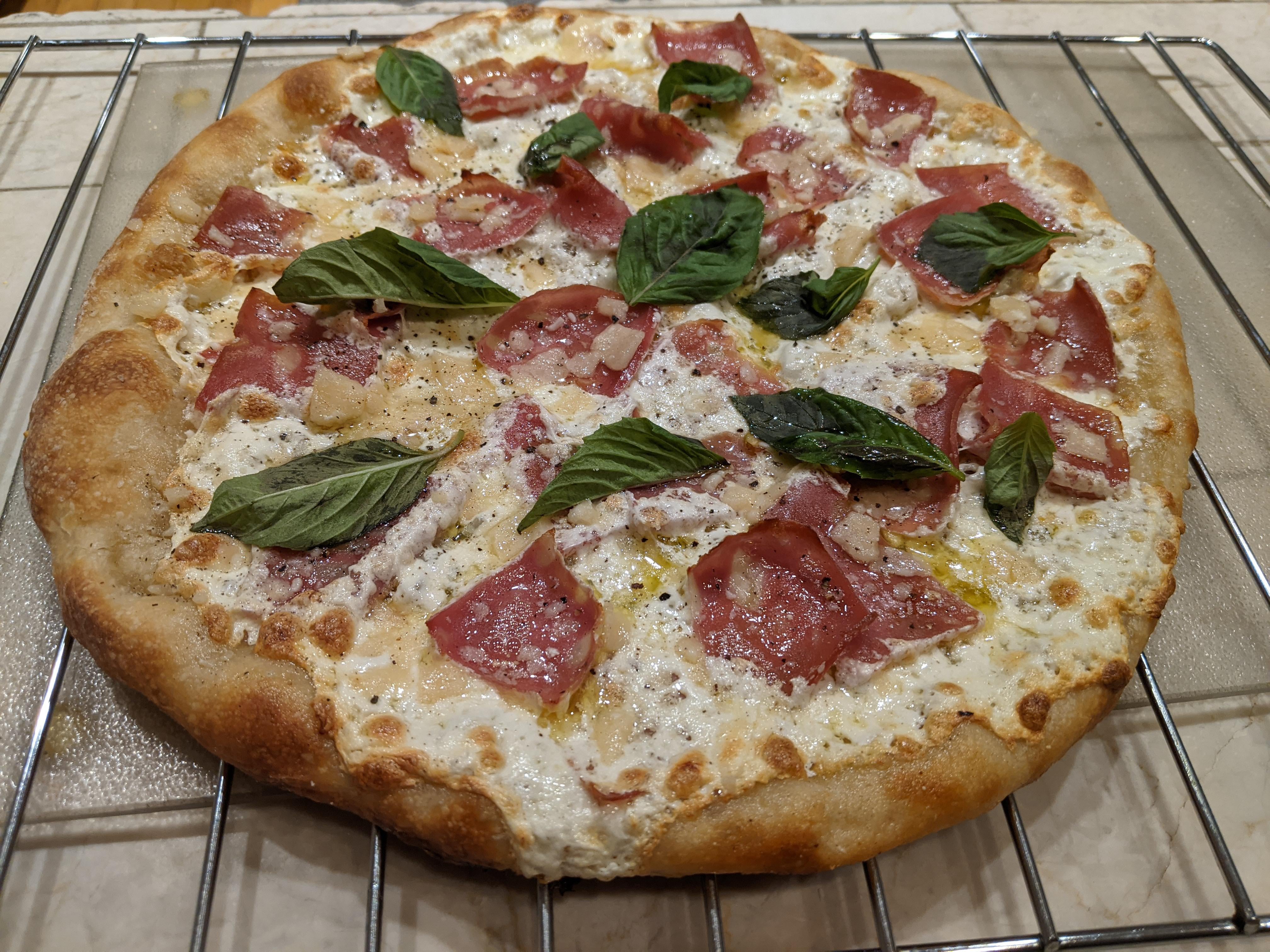 Garlic oil & mortadella with mozzarella, parm and basil Dining and