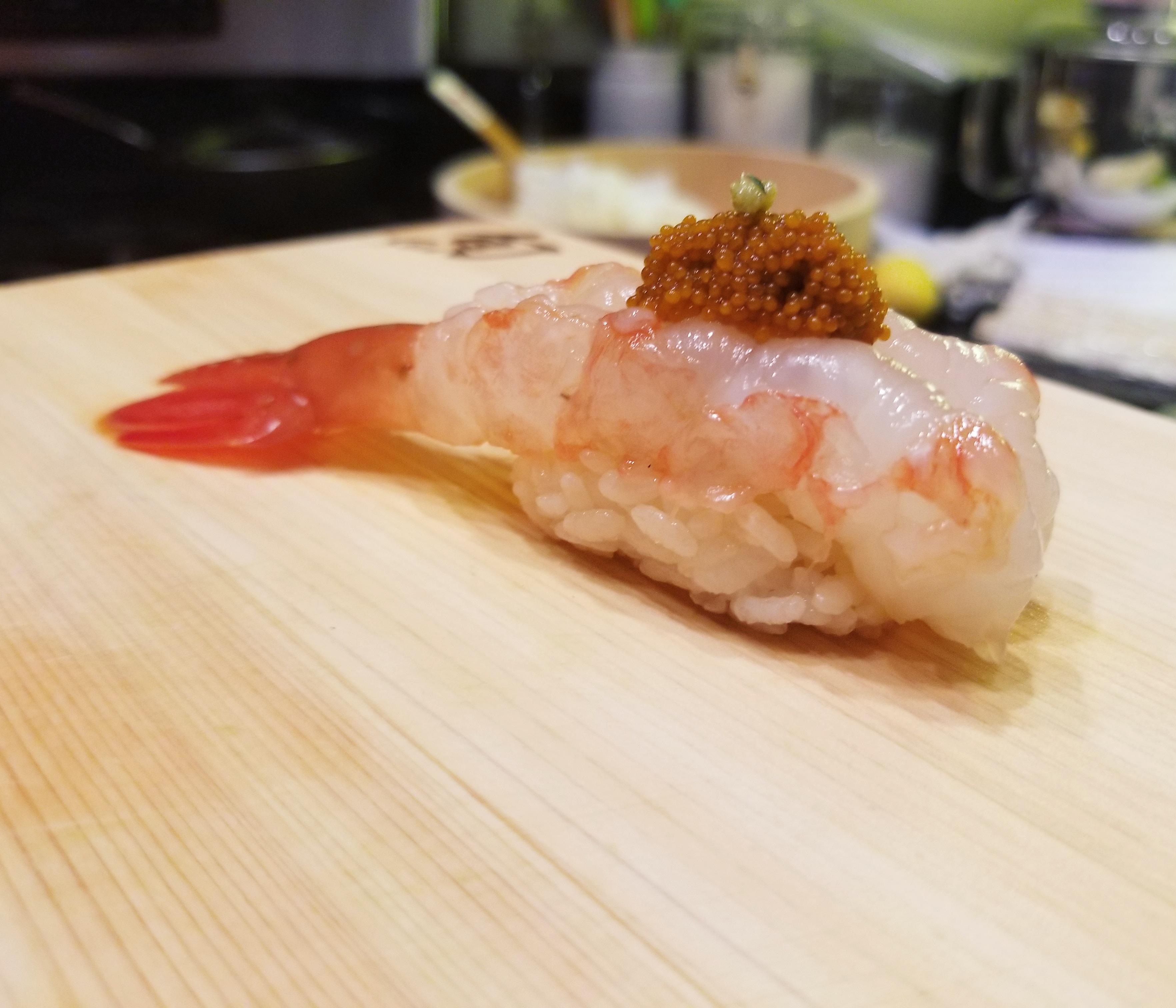 Fresh amaebi (spotted prawn sweet shrimp) topped with its own roe