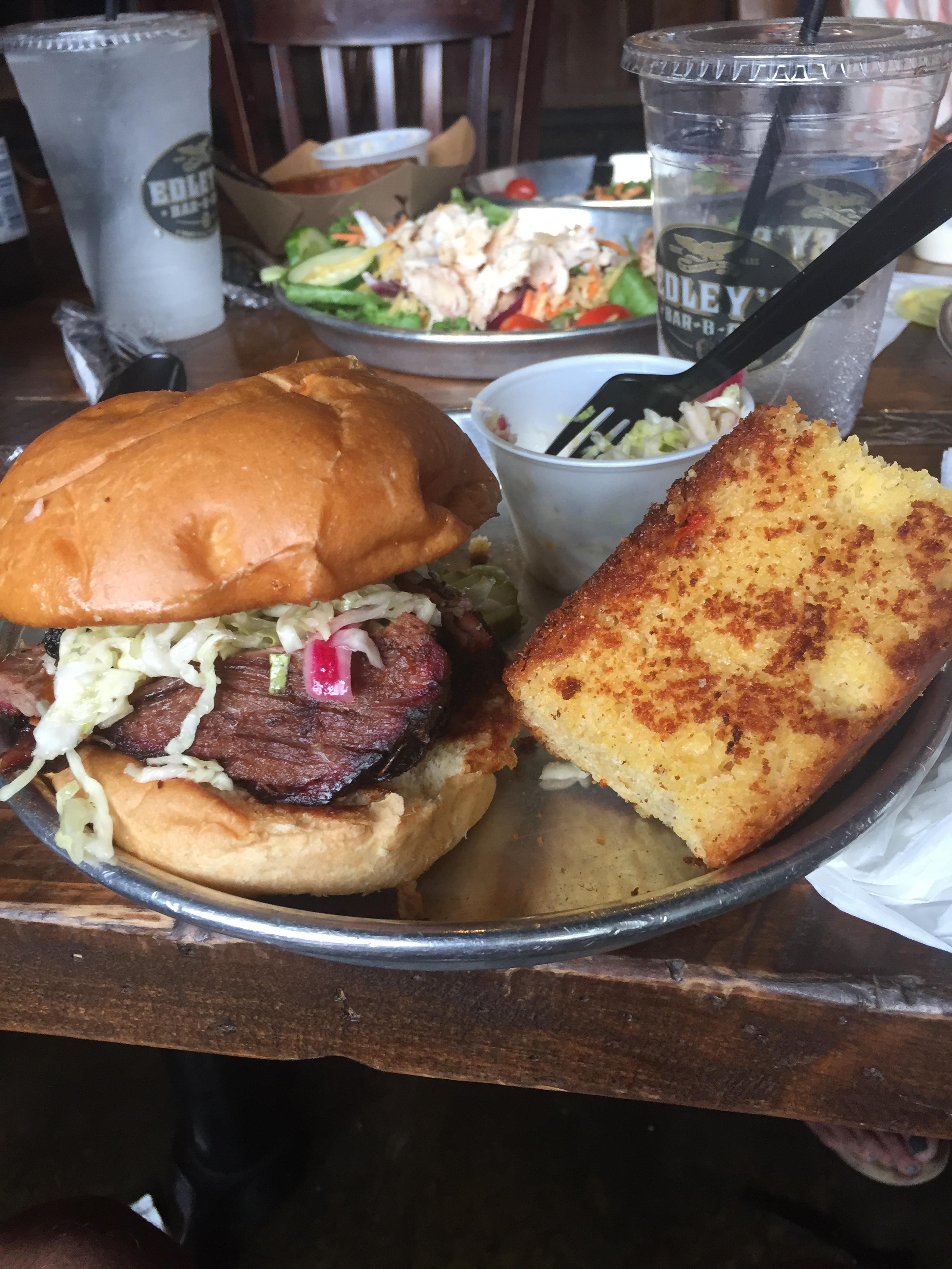 Edley's BBQ near Nashville. Brisket sandwich with crispy cornbread and coleslaw Dining and Cooking