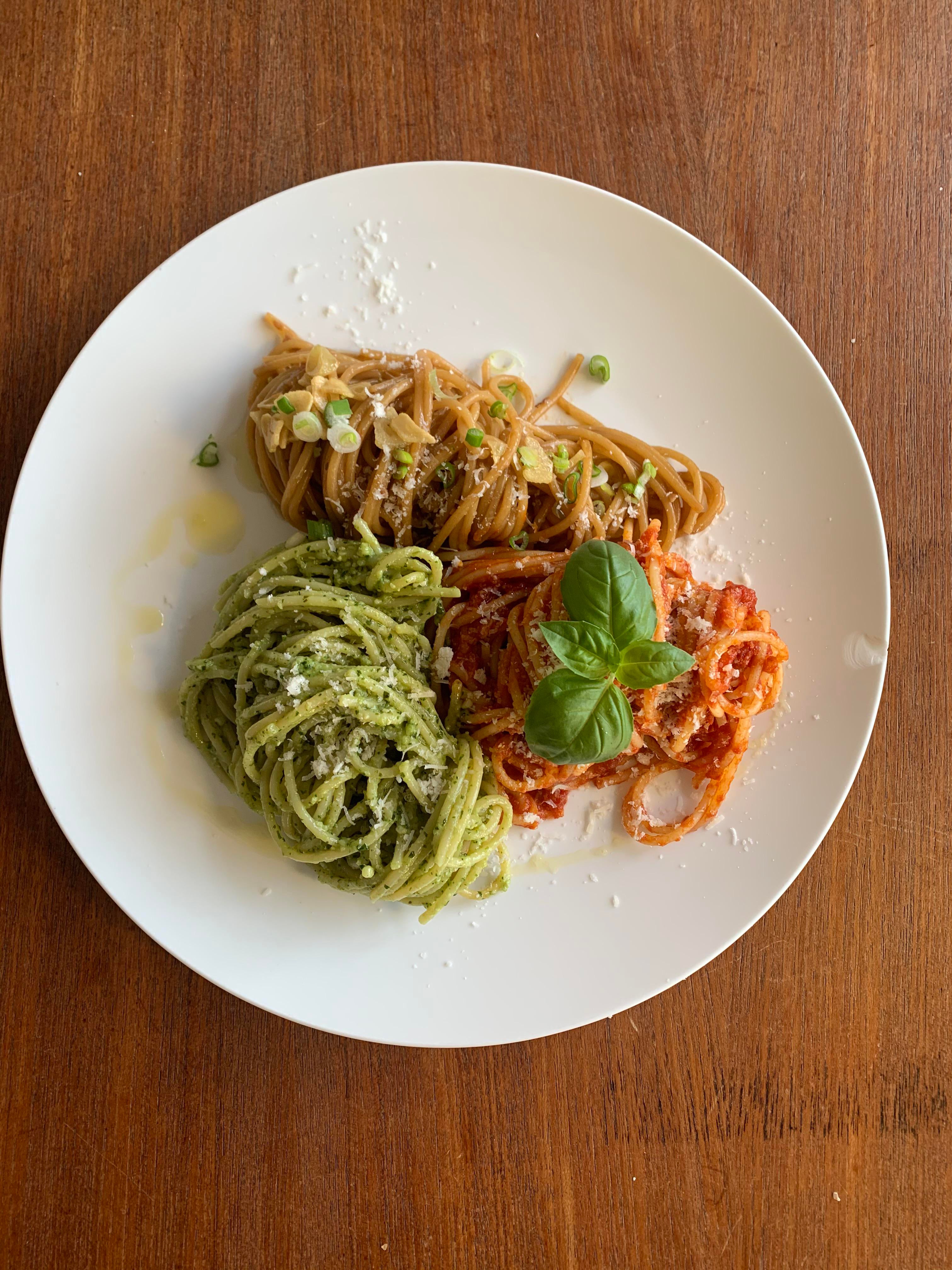 Pasta “Tricolore” marinara, pesto genovese, and oysterbuttersoy