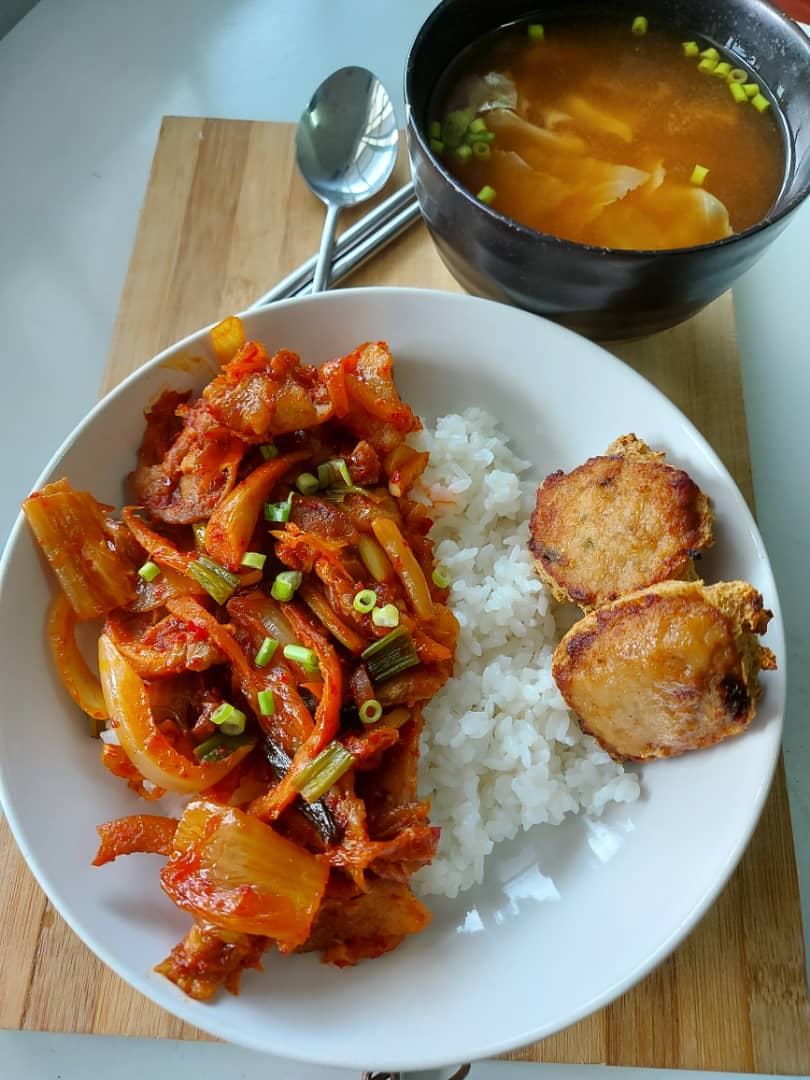 Kimchi pork stir fry with pork stuffed tofu and miso soup Dining and