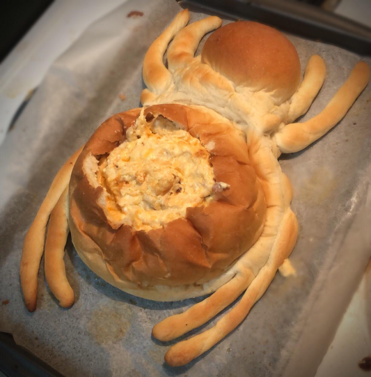 Spider bread bowl filled with buffalo chicken dip goodness. 😋 Dining