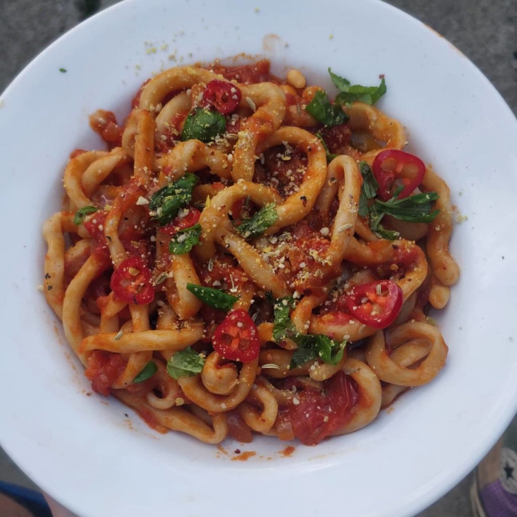 Homemade Pici pasta with a fennel, chilli and caper tomato sauce (recipe in comments)