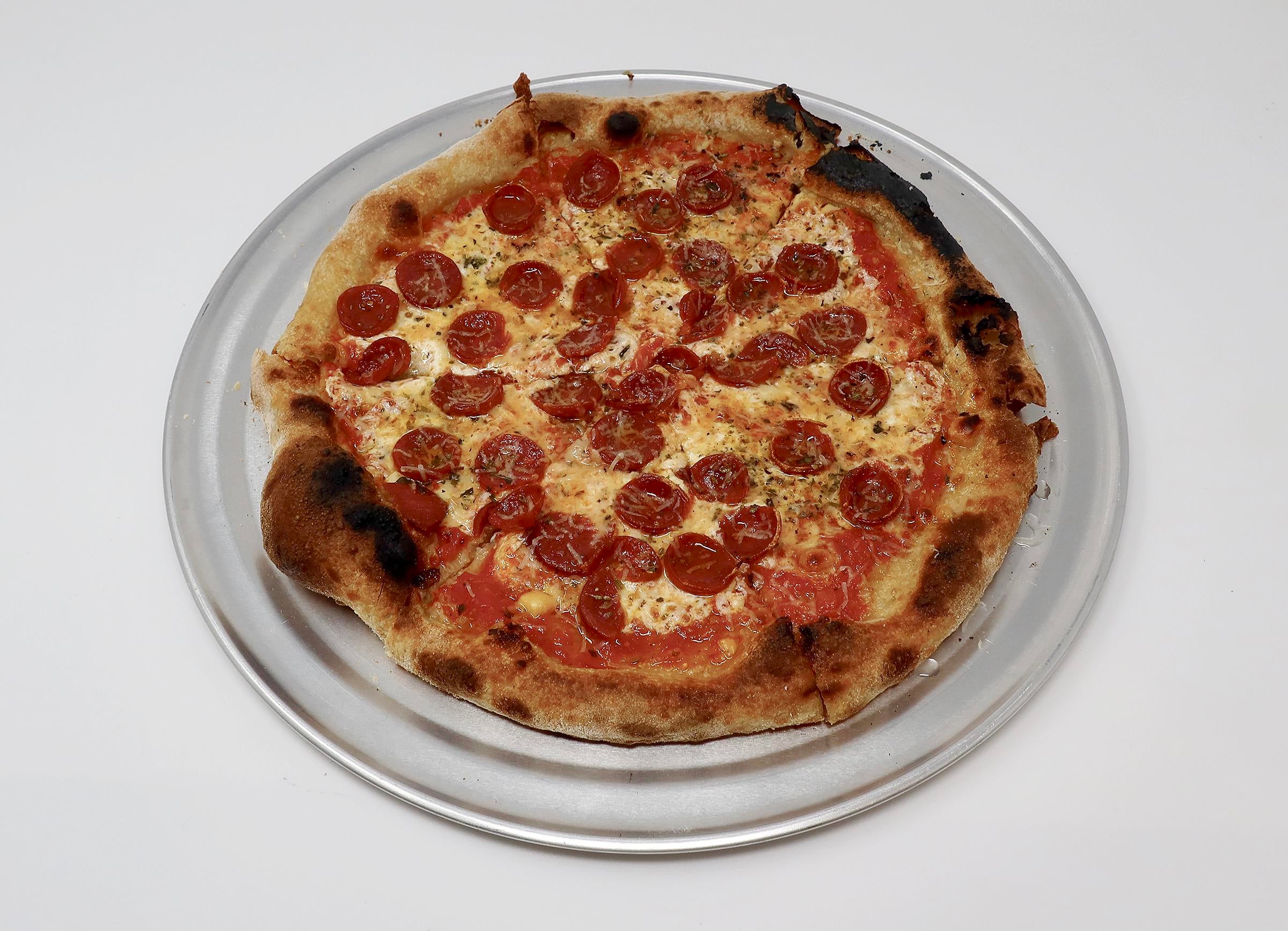 Slightly burned my New York style pepperoni Dining and Cooking