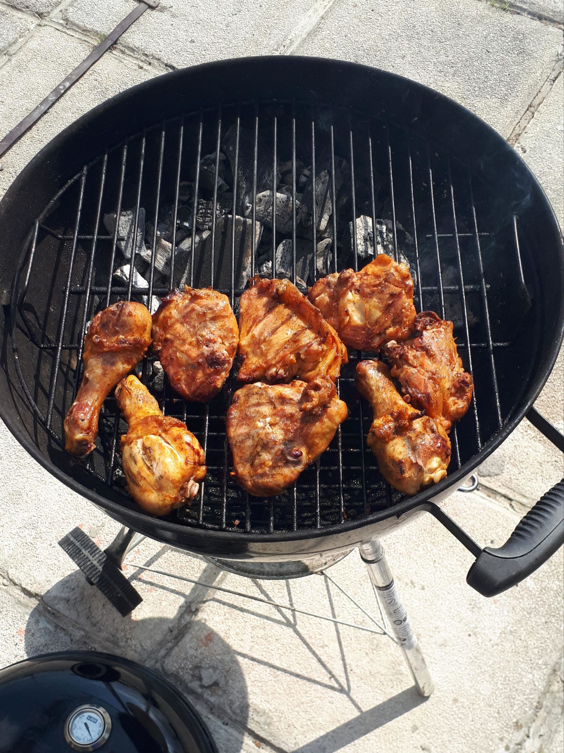 Webber indirect chicken legs smoked with whiskey chips... Yum Dining