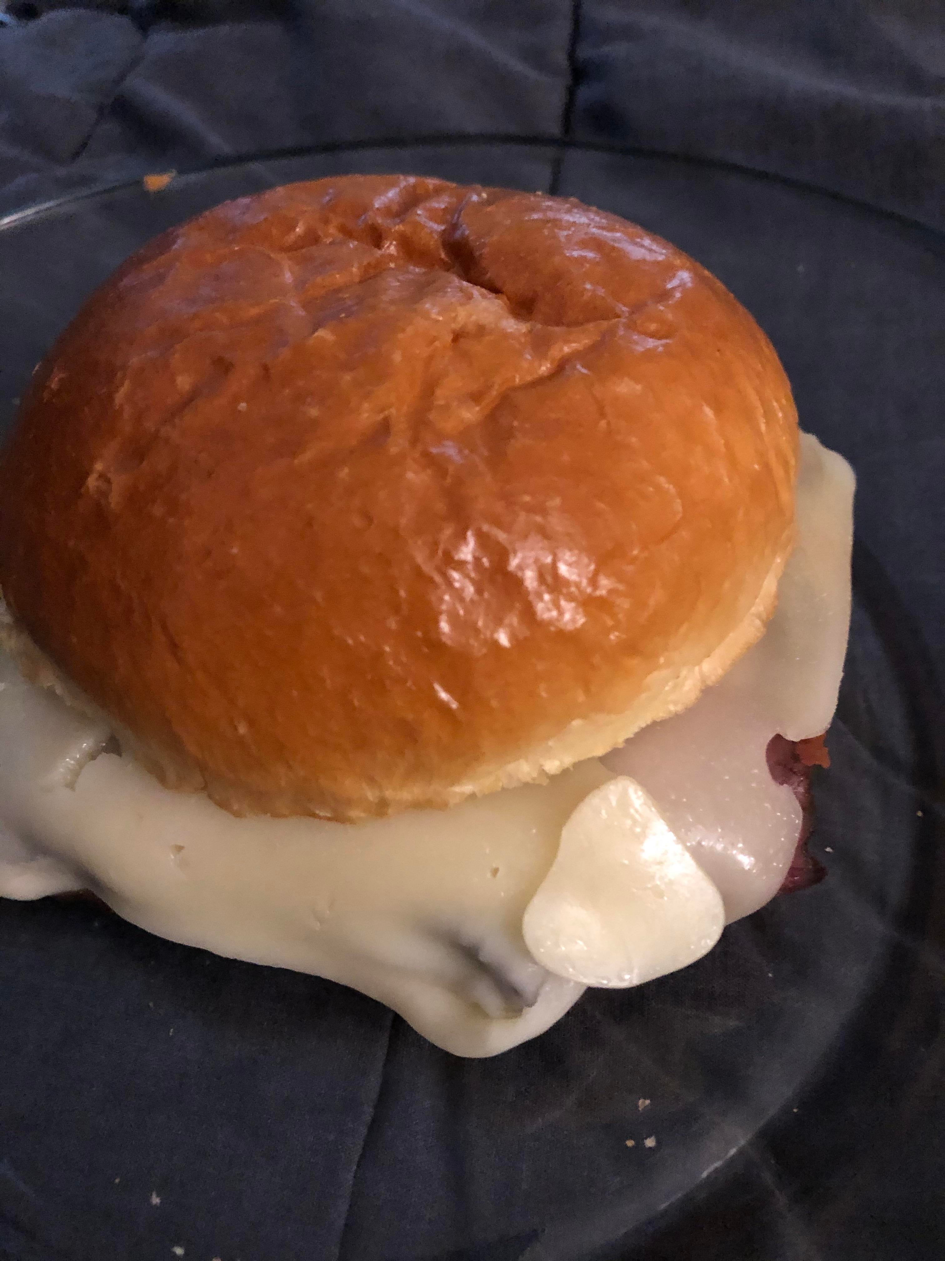 Toasted brioche bun, roast beef, melted Swiss cheese, hot German