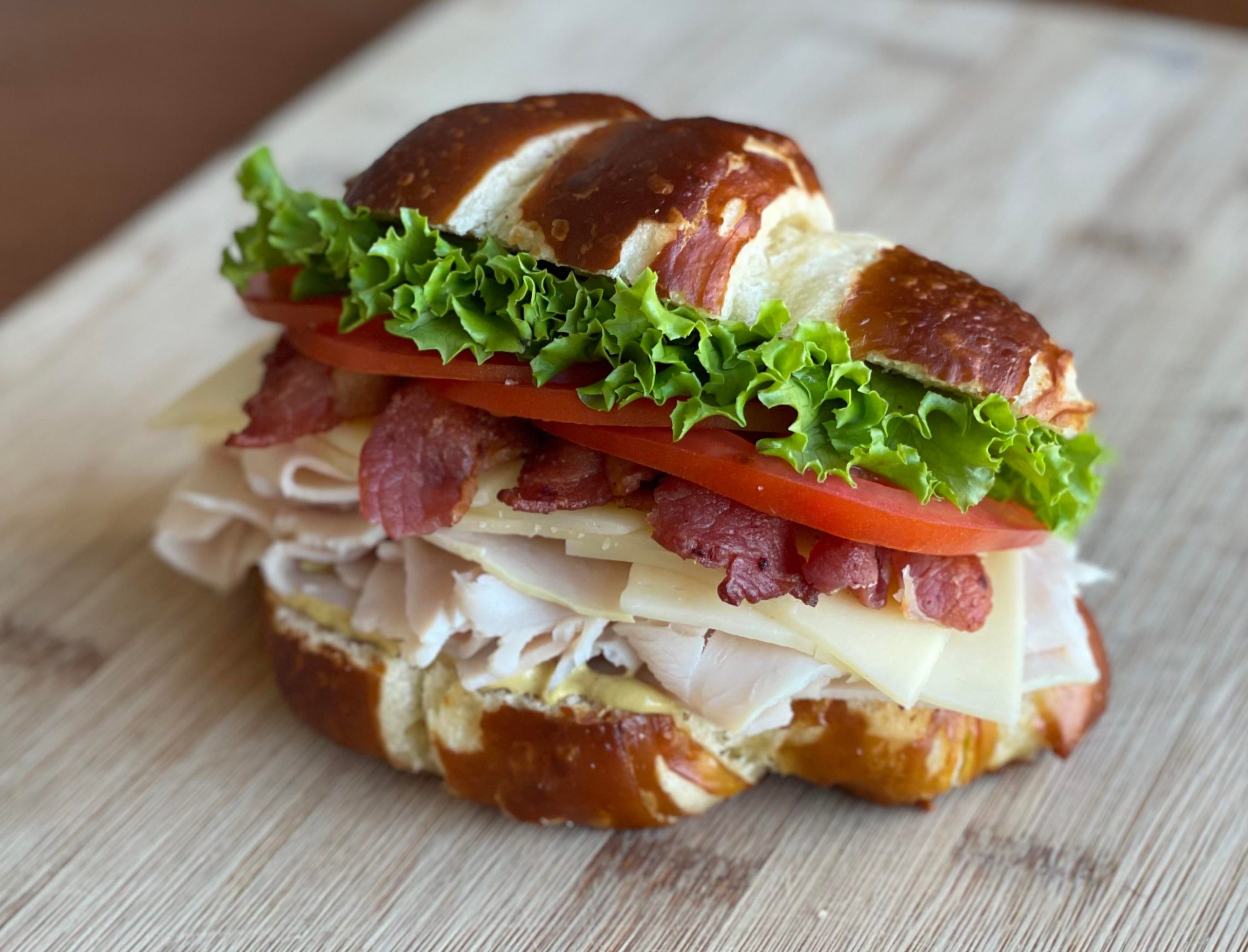 Turkey Club on a Homemade Pretzel Croissant Dining and Cooking