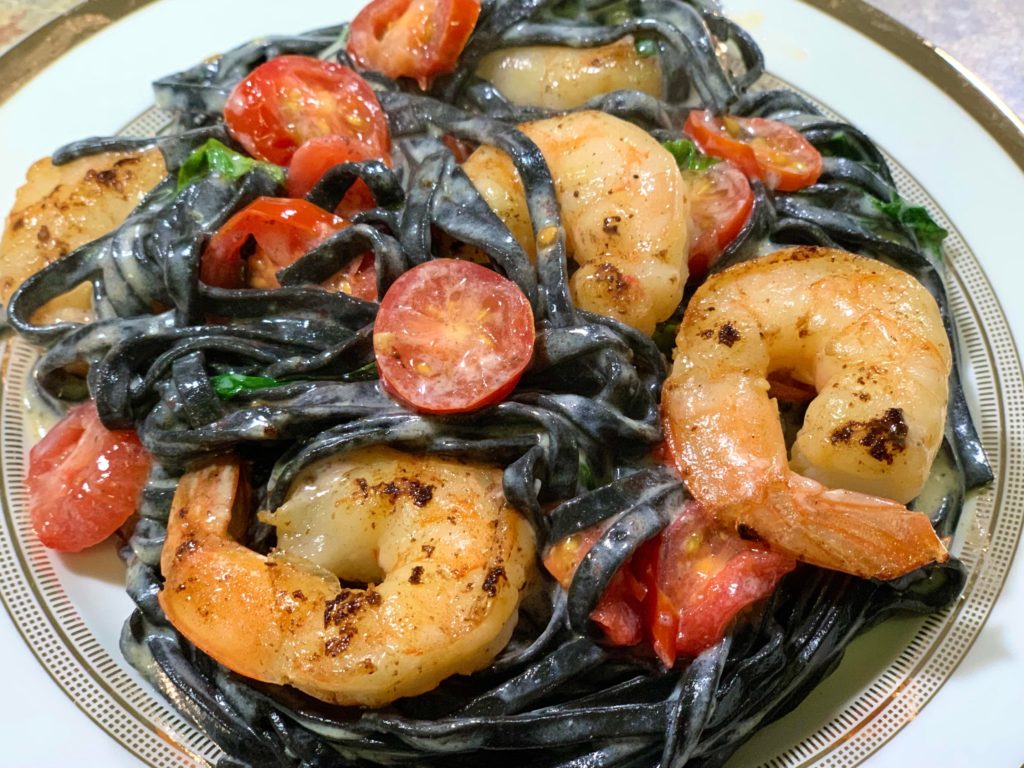 Squid ink pasta in a creamy sauce